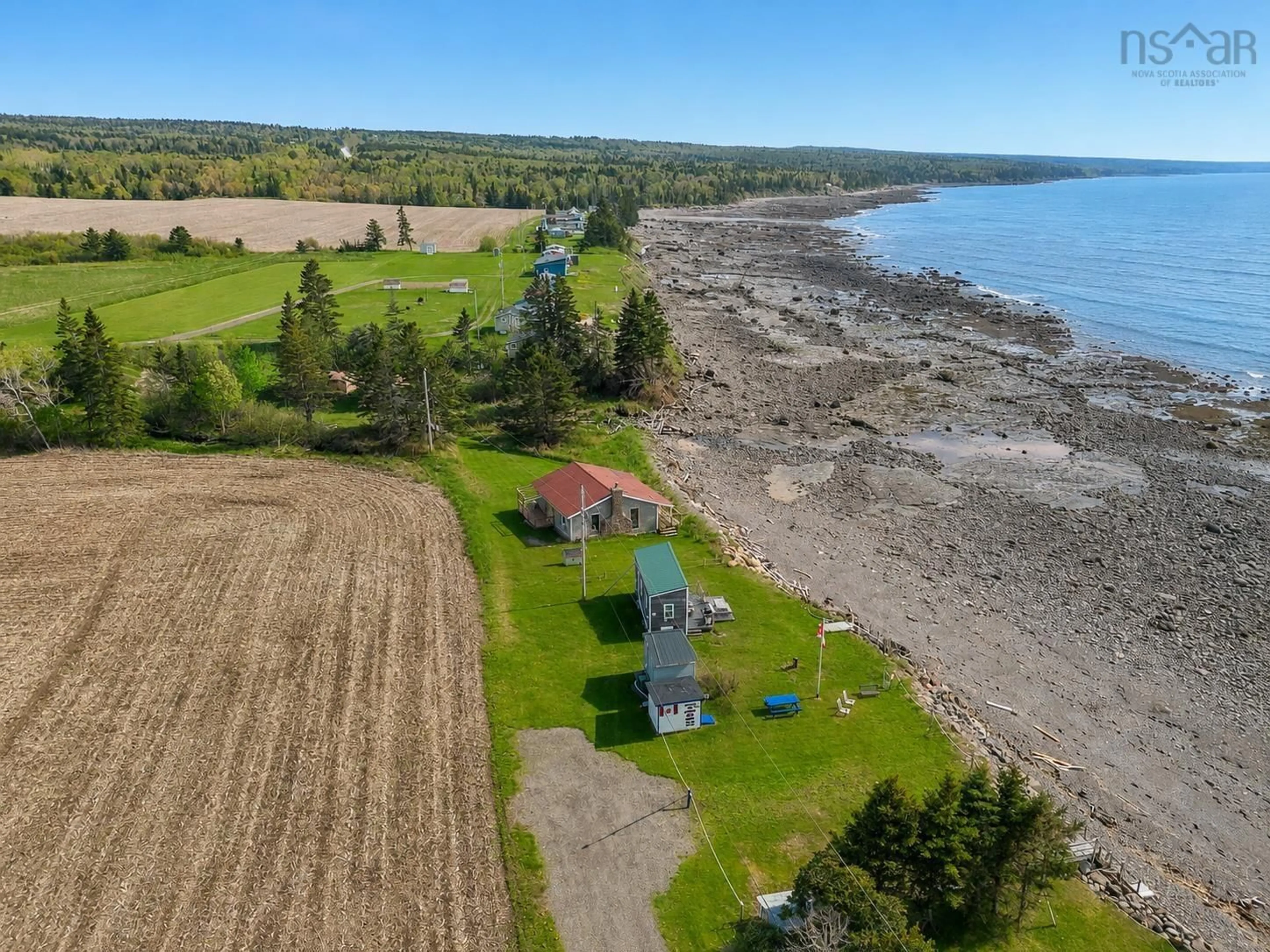 A pic from outside/outdoor area/front of a property/back of a property/a pic from drone, water/lake/river/ocean view for 113 Old Munroe Rd, Scots Bay Nova Scotia B0P 1H0