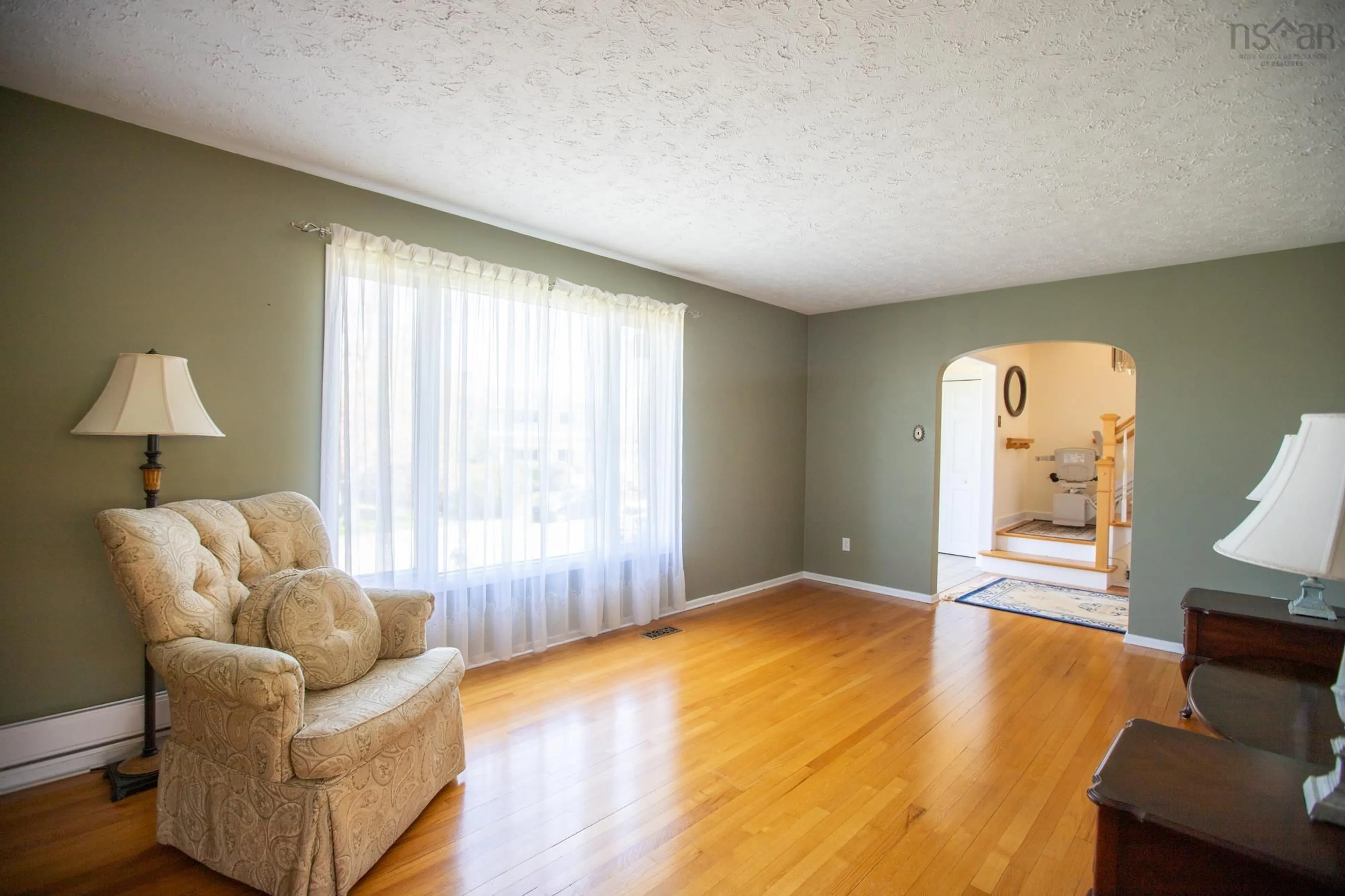 Living room with furniture, wood/laminate floor for 5 Swallow St, Halifax Nova Scotia B3M 2T7