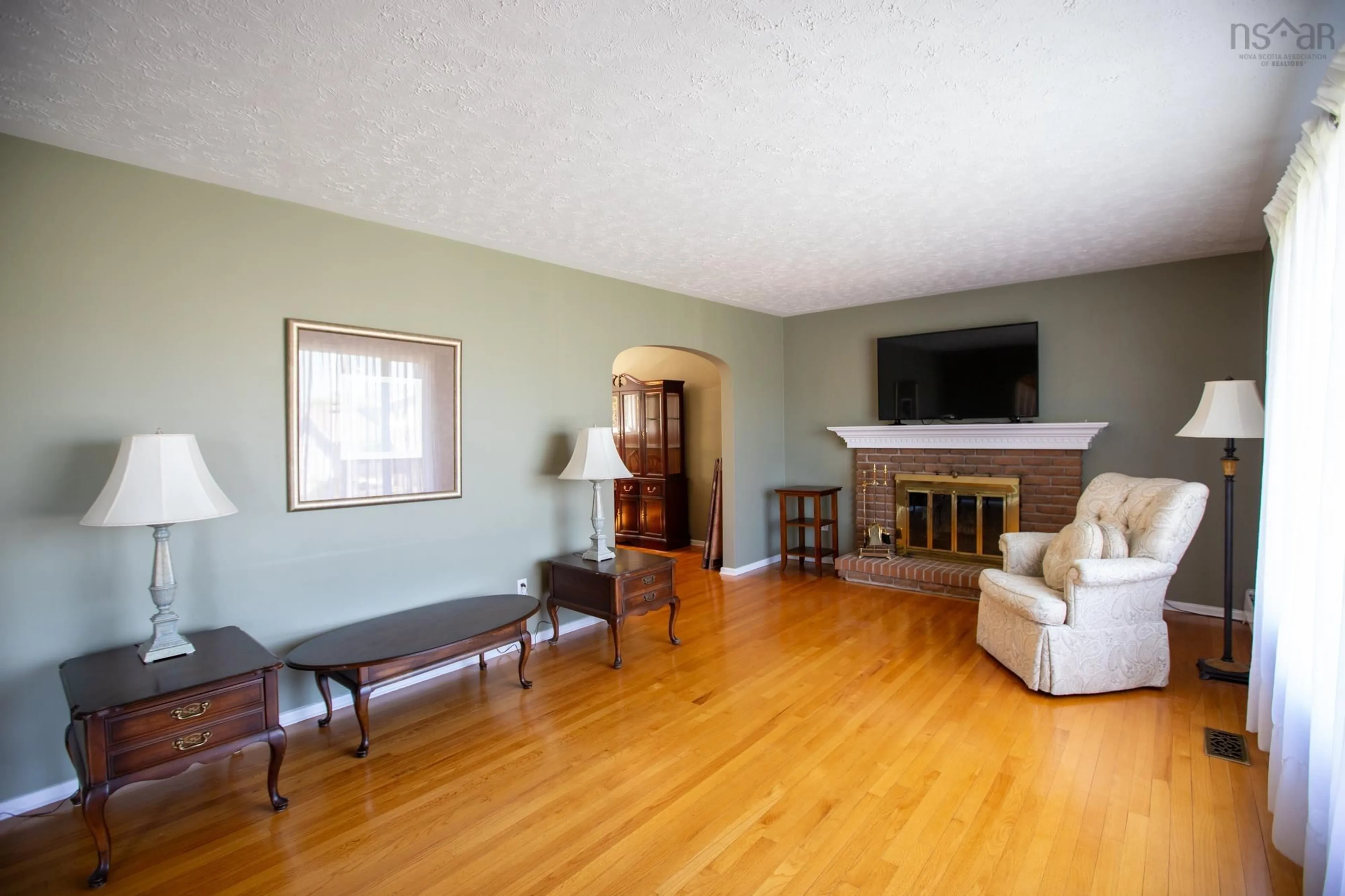 Living room with furniture, wood/laminate floor for 5 Swallow St, Halifax Nova Scotia B3M 2T7