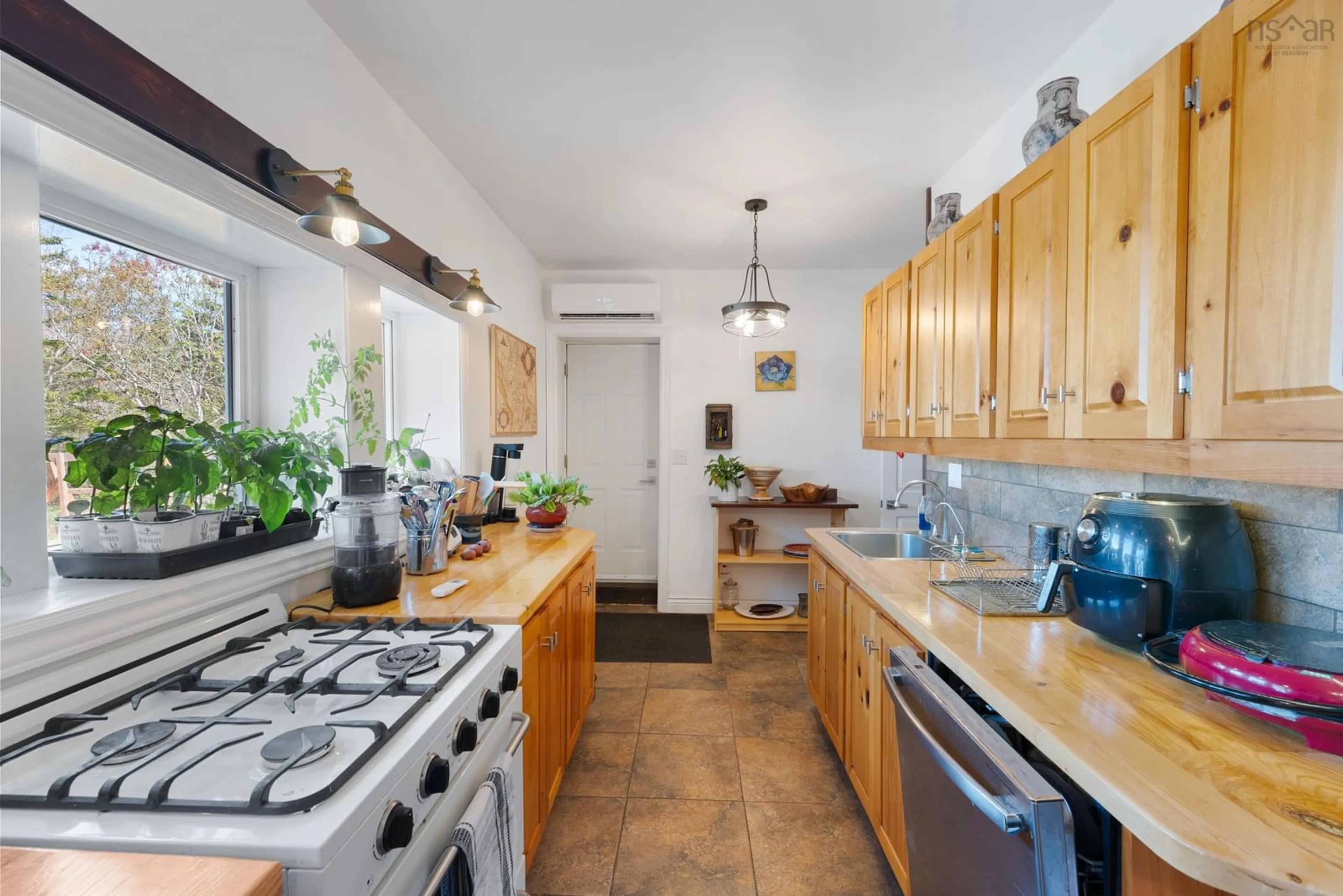 Standard kitchen, ceramic/tile floor for 2292 Highway 3, Pubnico Nova Scotia B0W 3S0