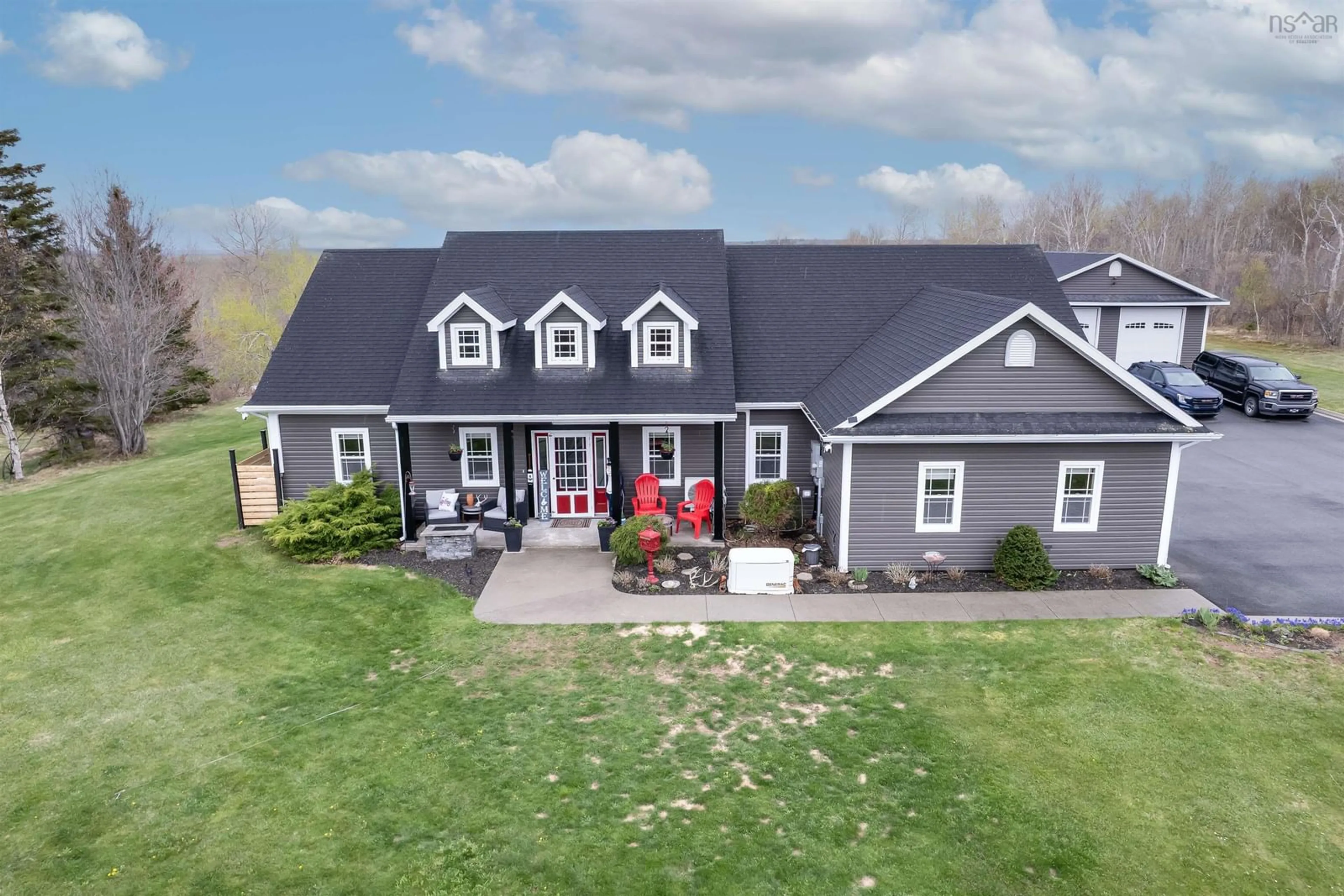 A pic from outside/outdoor area/front of a property/back of a property/a pic from drone, unknown for 102 Kaneville Road, New Victoria Nova Scotia B1H 5T1