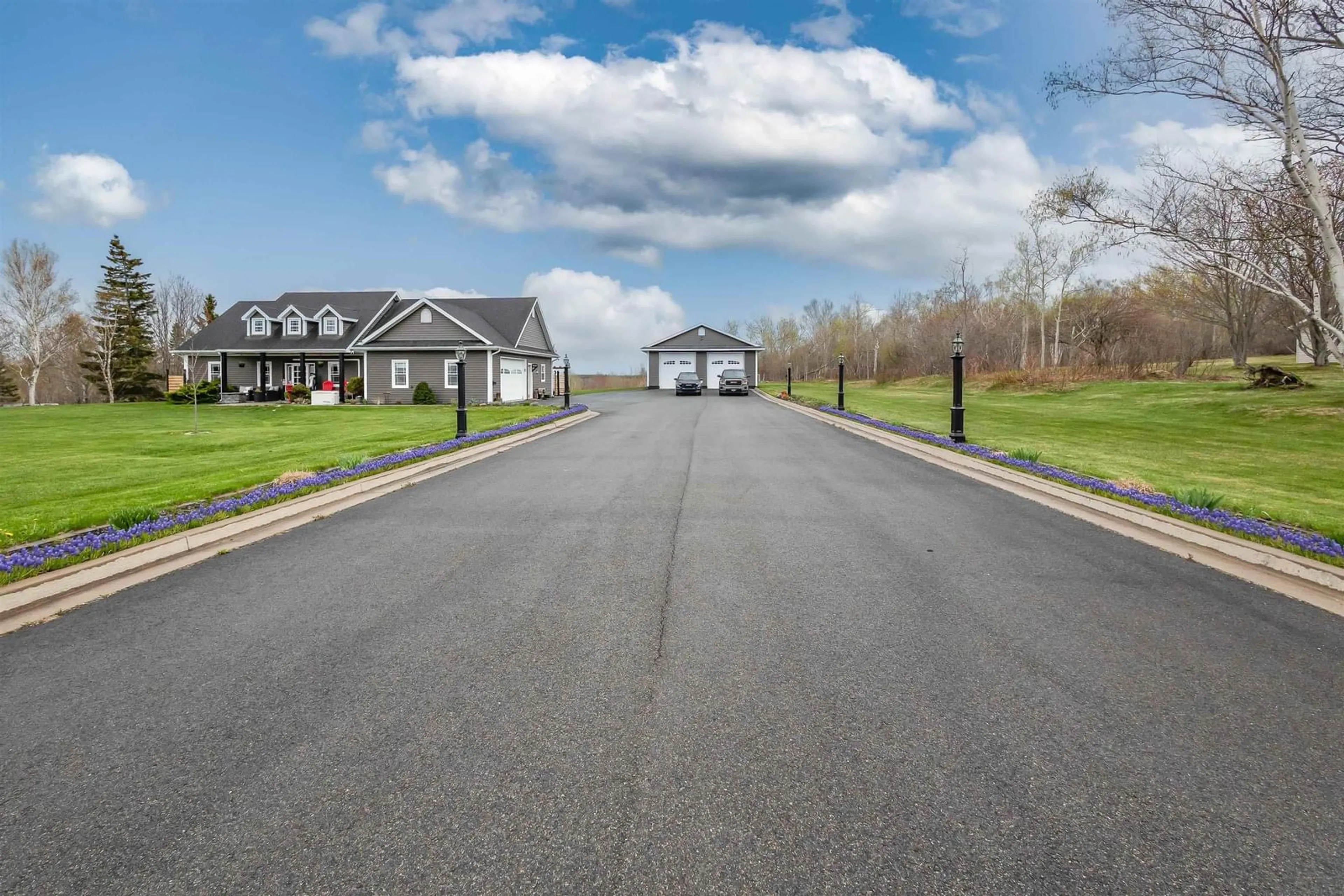 A pic from outside/outdoor area/front of a property/back of a property/a pic from drone, street for 102 Kaneville Road, New Victoria Nova Scotia B1H 5T1