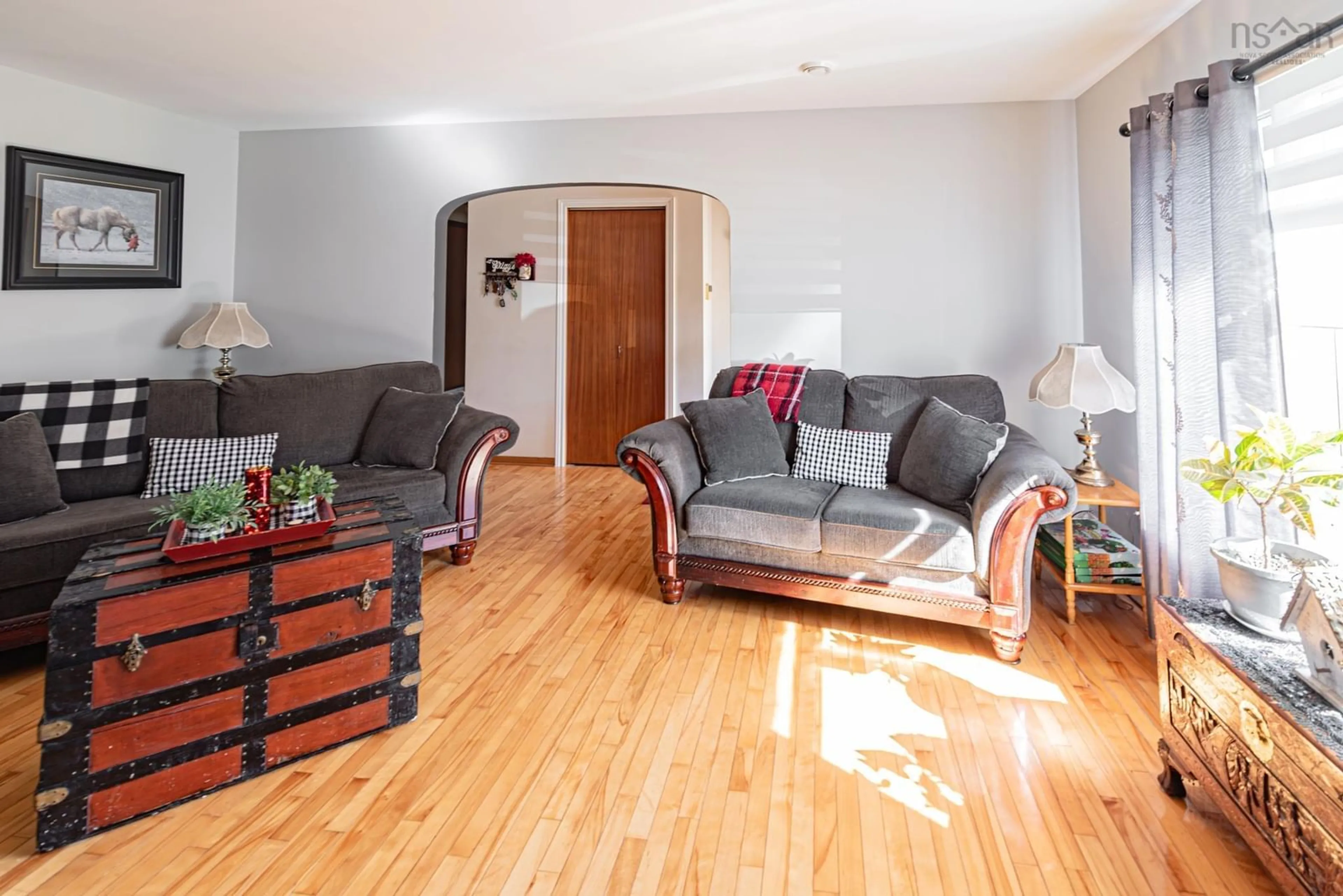 Living room with furniture, wood/laminate floor for 4 Three Brooks Rd, Three Brooks Nova Scotia B0K 1H0