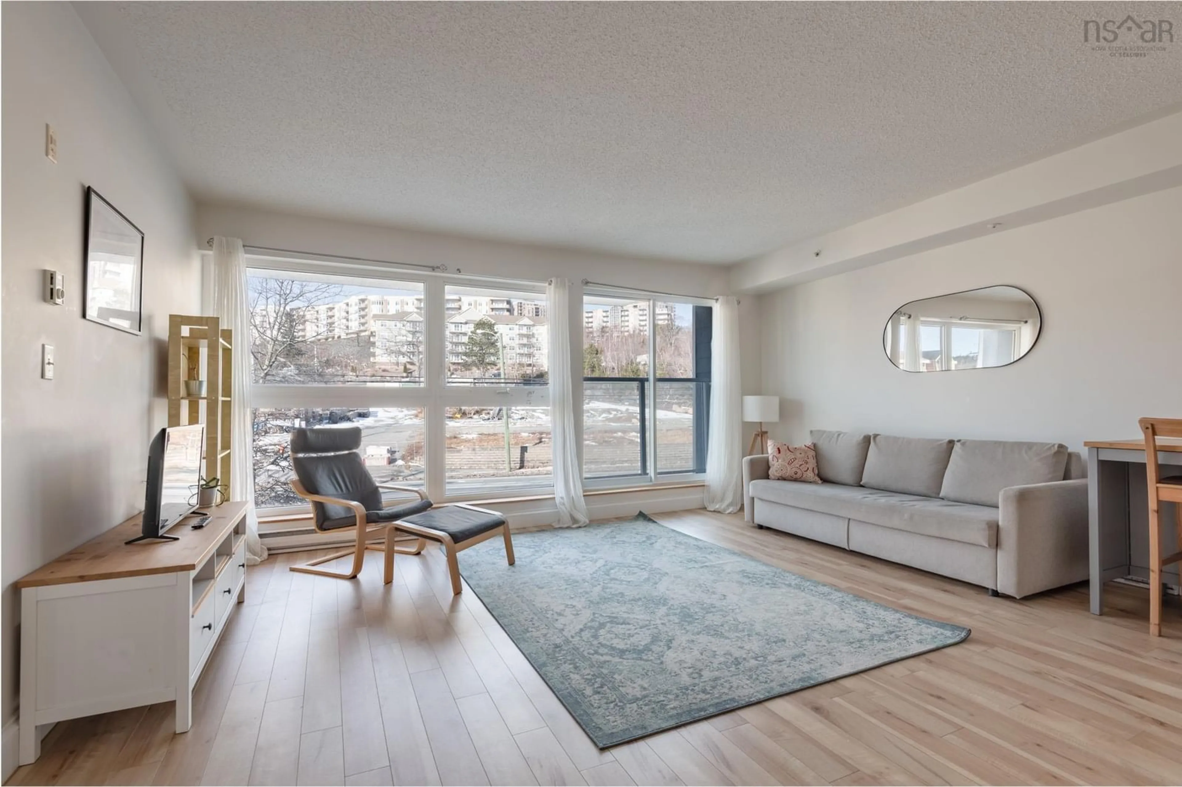 Living room with furniture, unknown for 647 Bedford Hwy #208, Halifax Nova Scotia B3M 0A5
