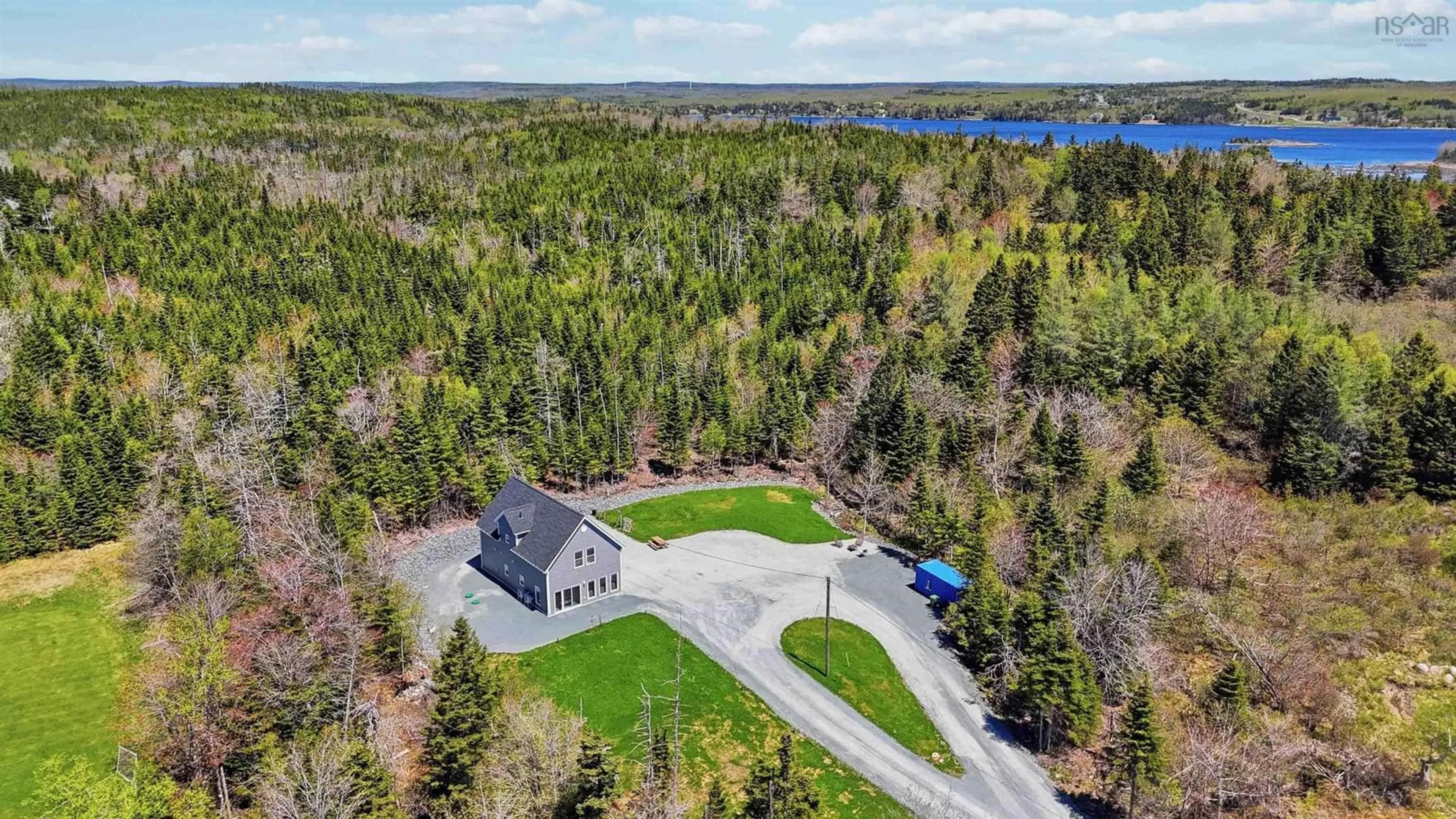 A pic from outside/outdoor area/front of a property/back of a property/a pic from drone, water/lake/river/ocean view for 3411 Lawrencetown Rd, Lawrencetown Nova Scotia B2Z 1R5