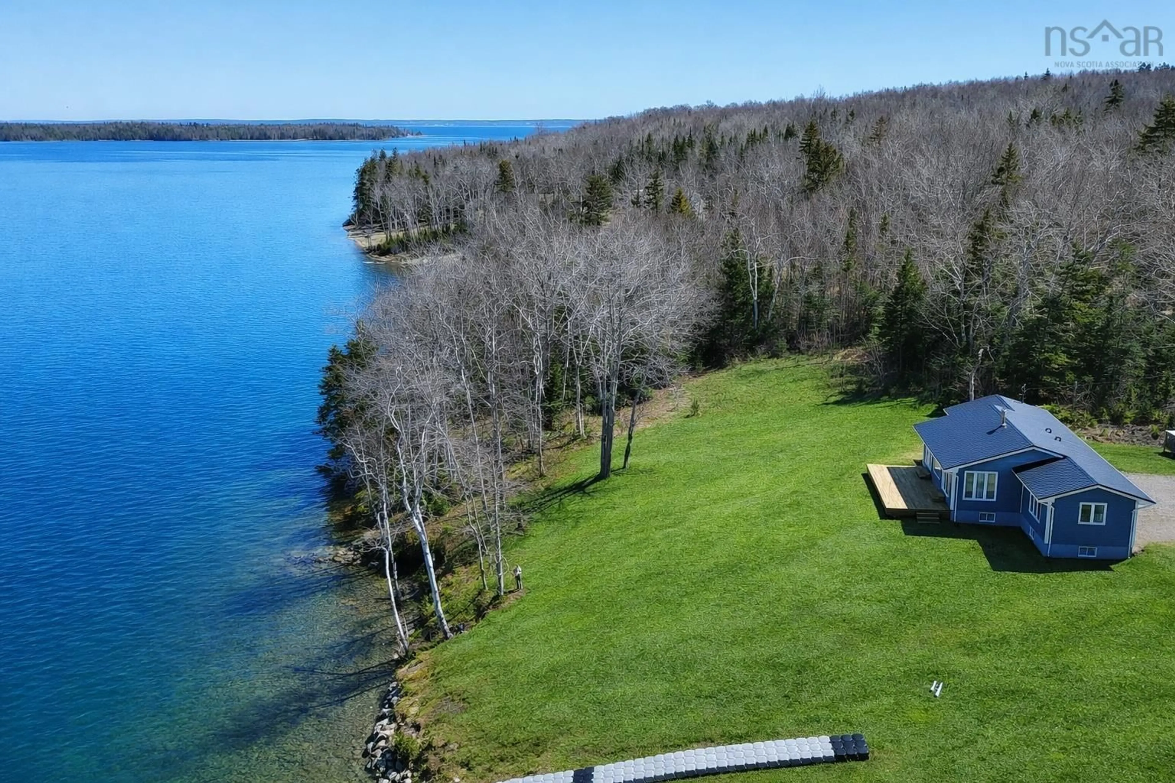 A pic from outside/outdoor area/front of a property/back of a property/a pic from drone, water/lake/river/ocean view for 7212 Marble Mountain Road, Marble Mountain Nova Scotia B0E 2Y0