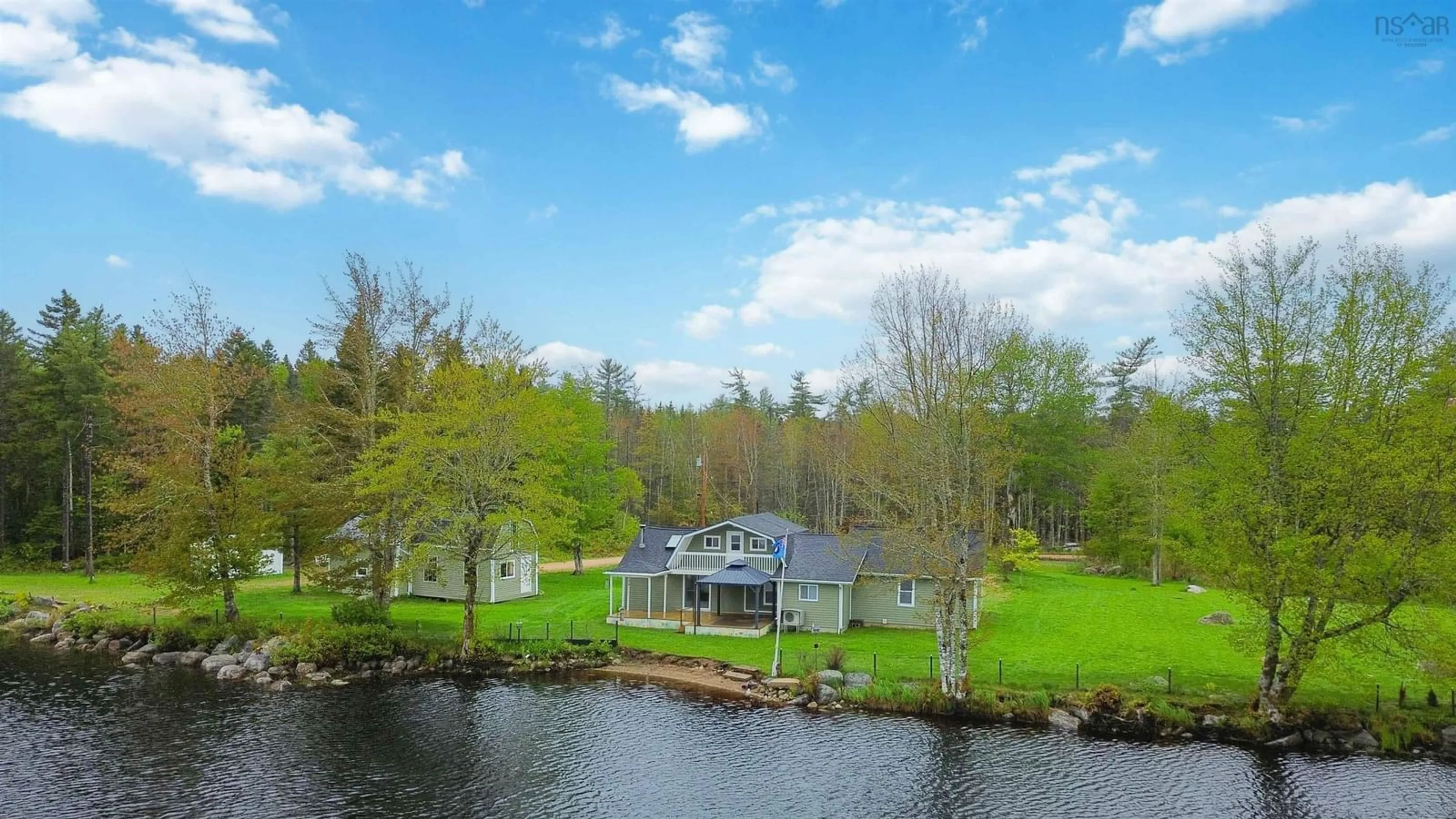 A pic from outside/outdoor area/front of a property/back of a property/a pic from drone, water/lake/river/ocean view for 244 East Lake Rd, New Albany Nova Scotia B0S 1P0