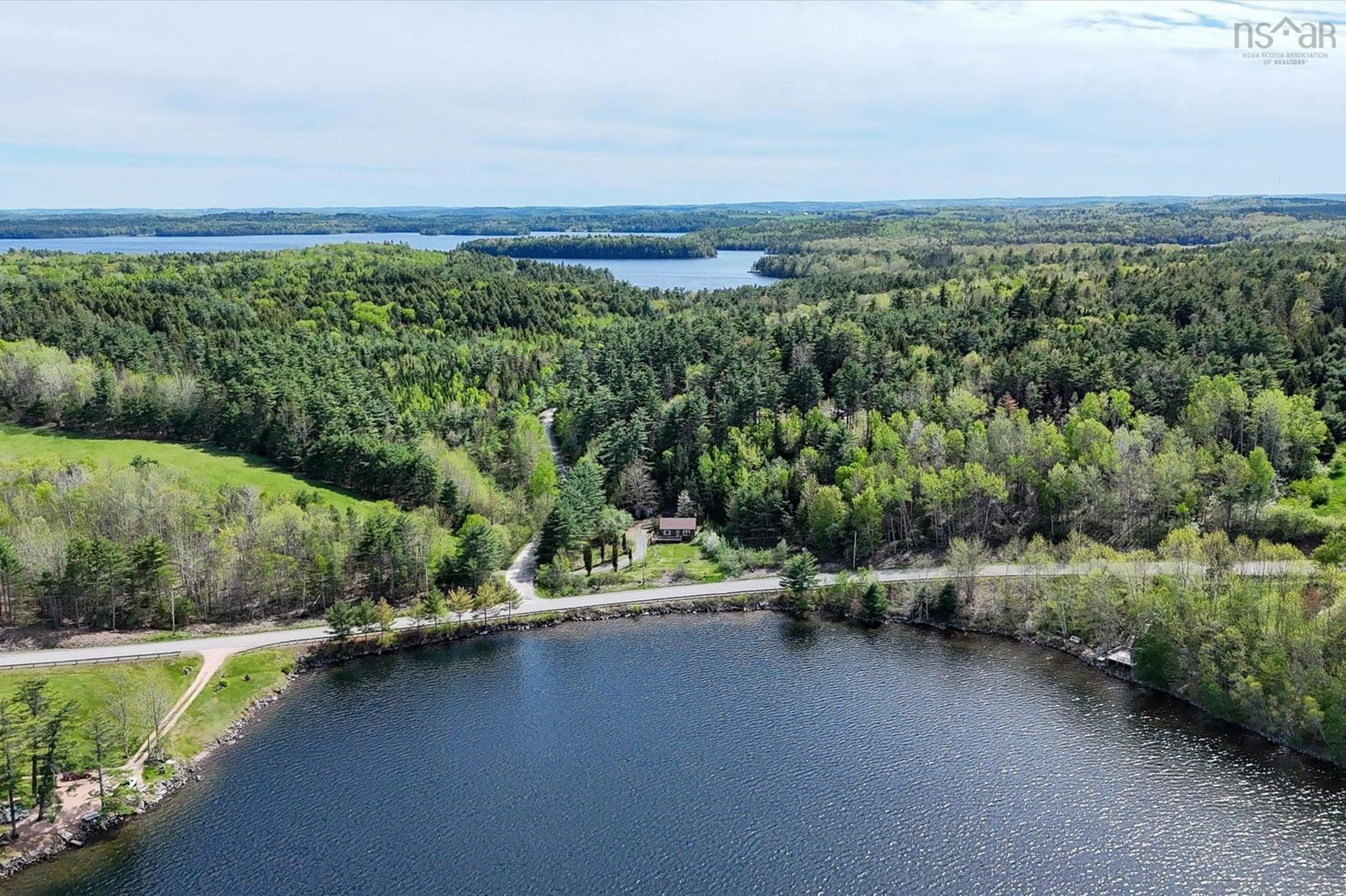 A pic from outside/outdoor area/front of a property/back of a property/a pic from drone, water/lake/river/ocean view for 14 Big Mush A Mush Lake Rd, Middle New Cornwall Nova Scotia B0J 2E0