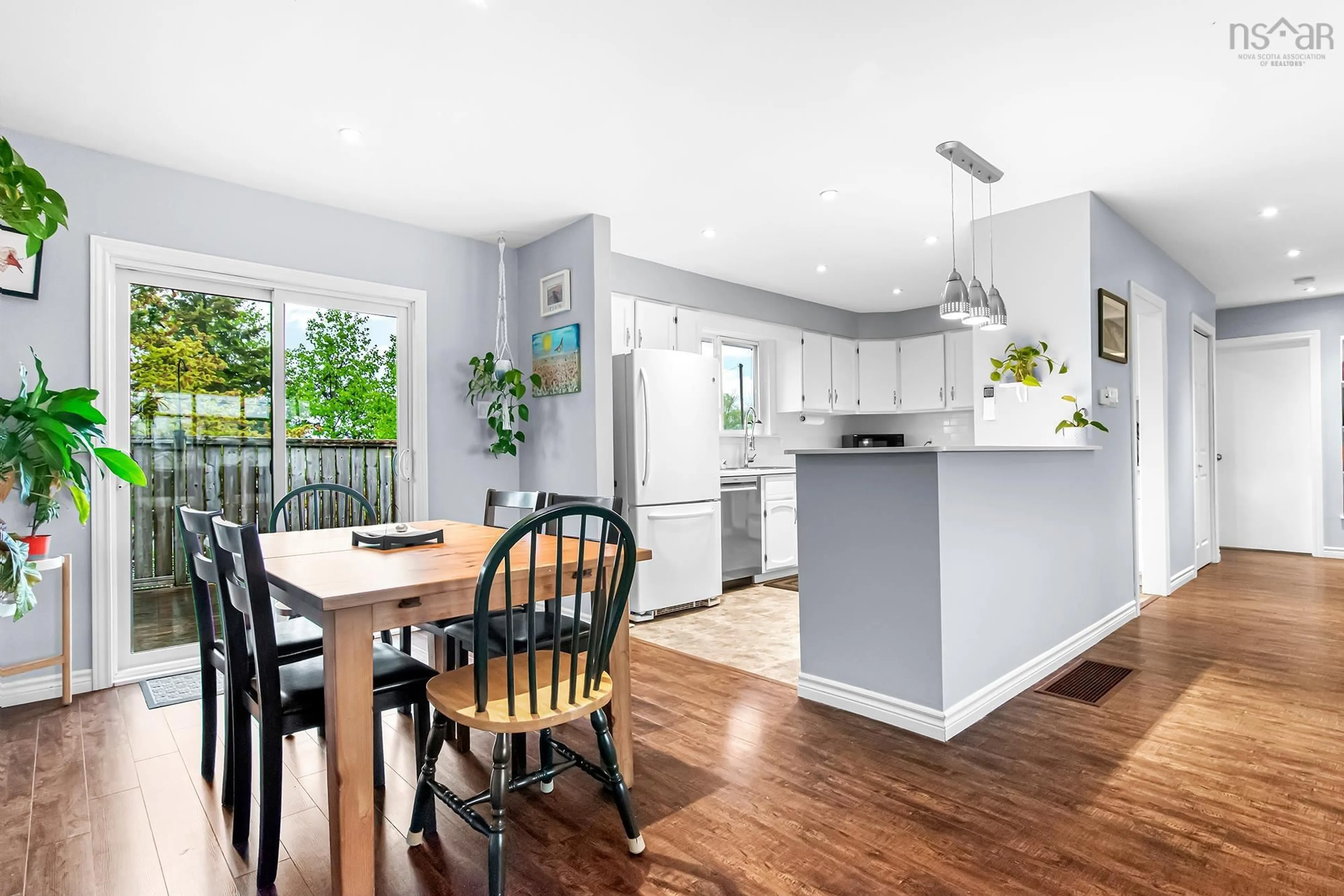 Open concept kitchen, wood/laminate floor for 73 Wexford Rd, Cole Harbour Nova Scotia B2V 1R8
