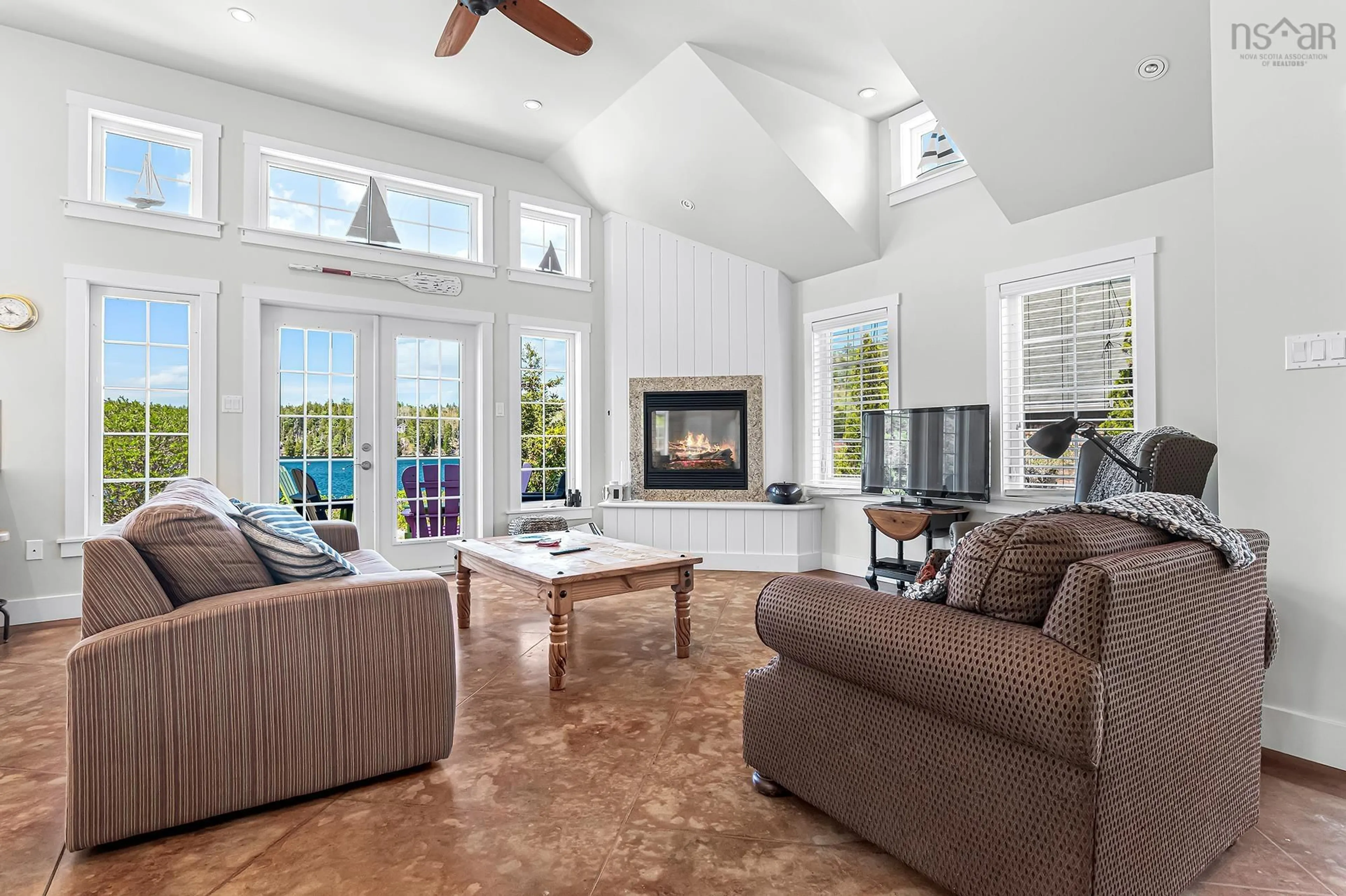 Living room with furniture, ceramic/tile floor for 6 Safe Harbour Close #5, Deep Cove Nova Scotia B0J 1T0
