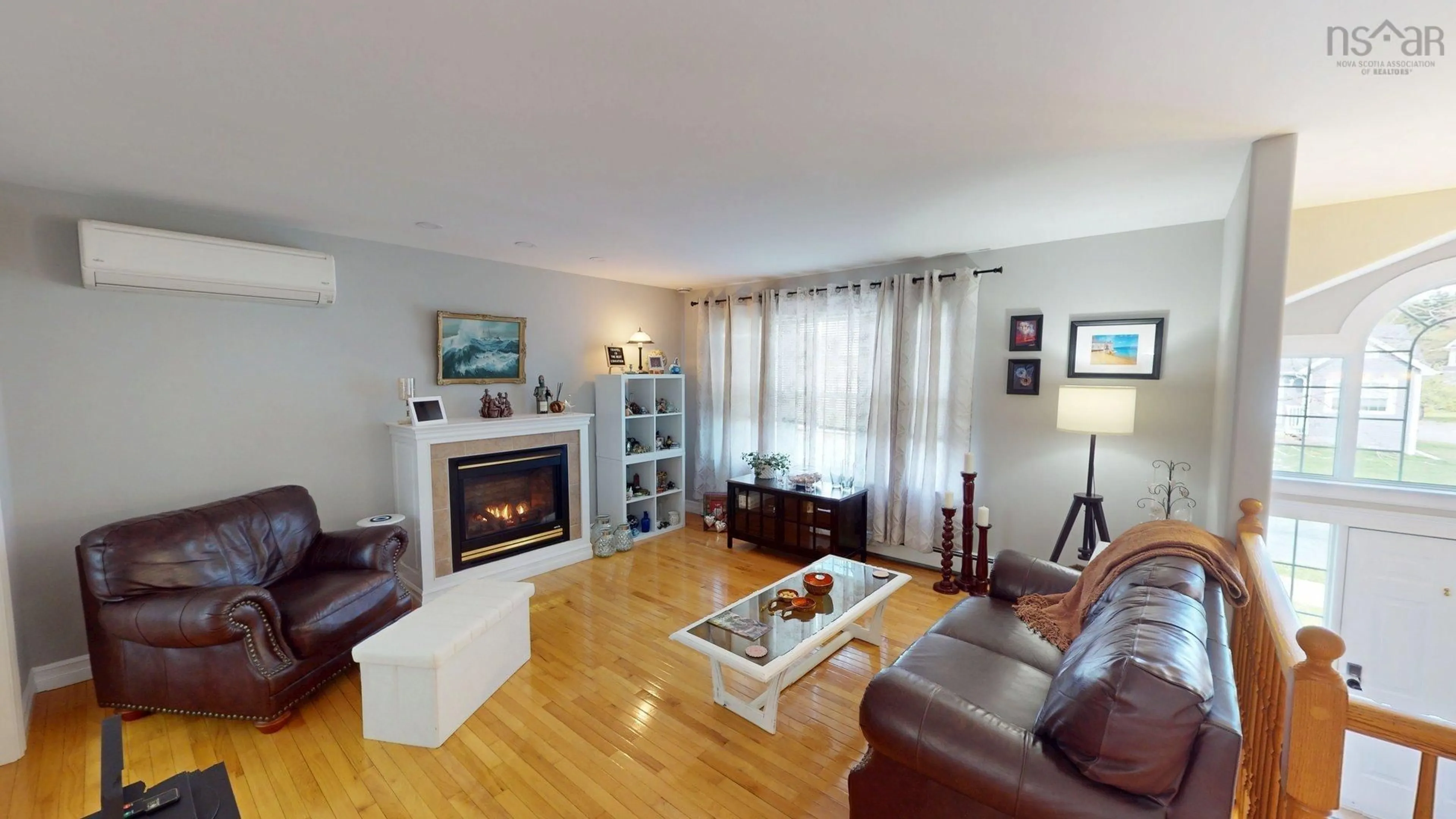 Living room with furniture, wood/laminate floor for 212 Rossing Drive, Middle Sackville Nova Scotia B4E 3N2