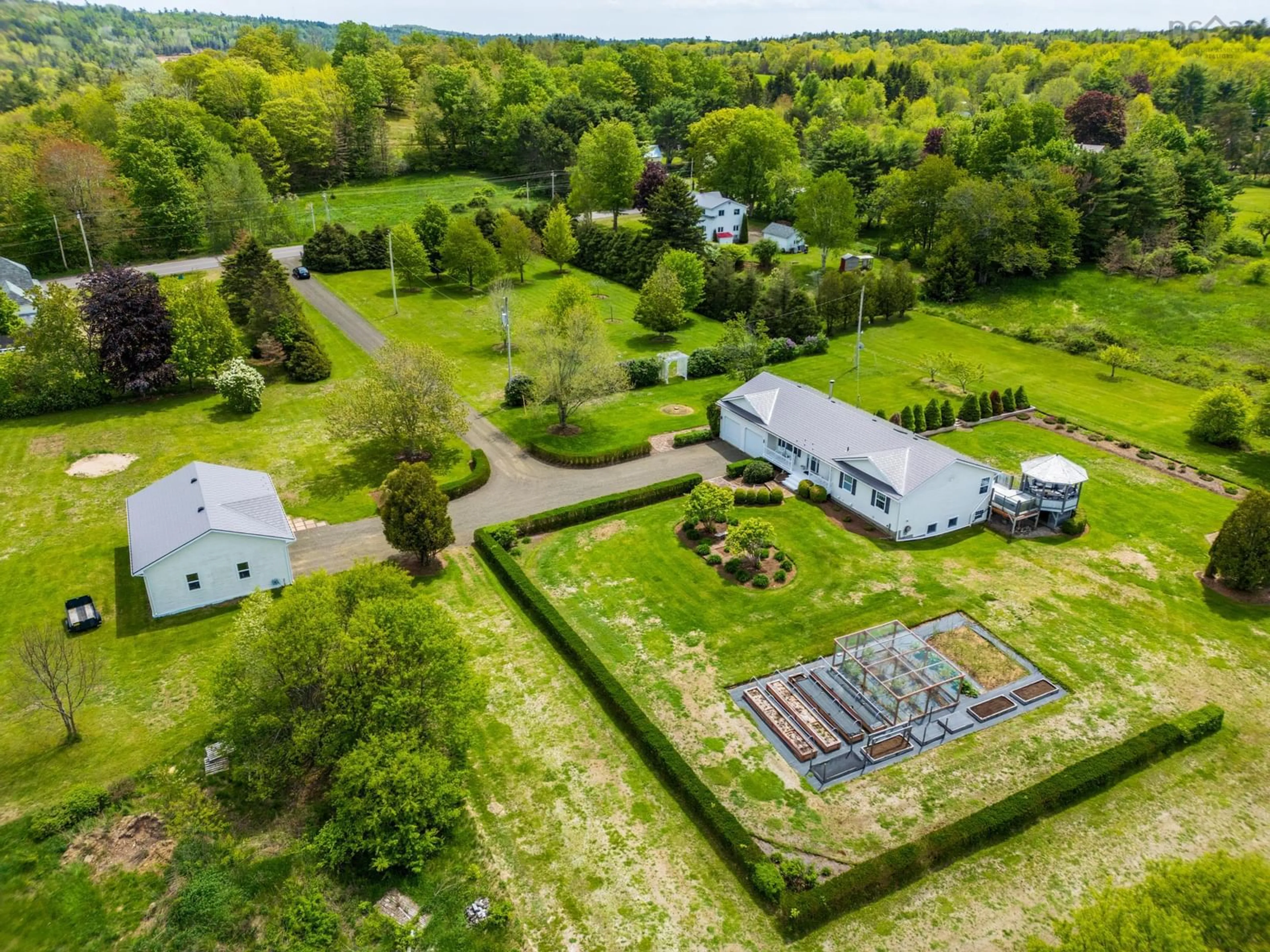 A pic from outside/outdoor area/front of a property/back of a property/a pic from drone, building for 1789 Highway 201, Round Hill Nova Scotia B0S 1C0