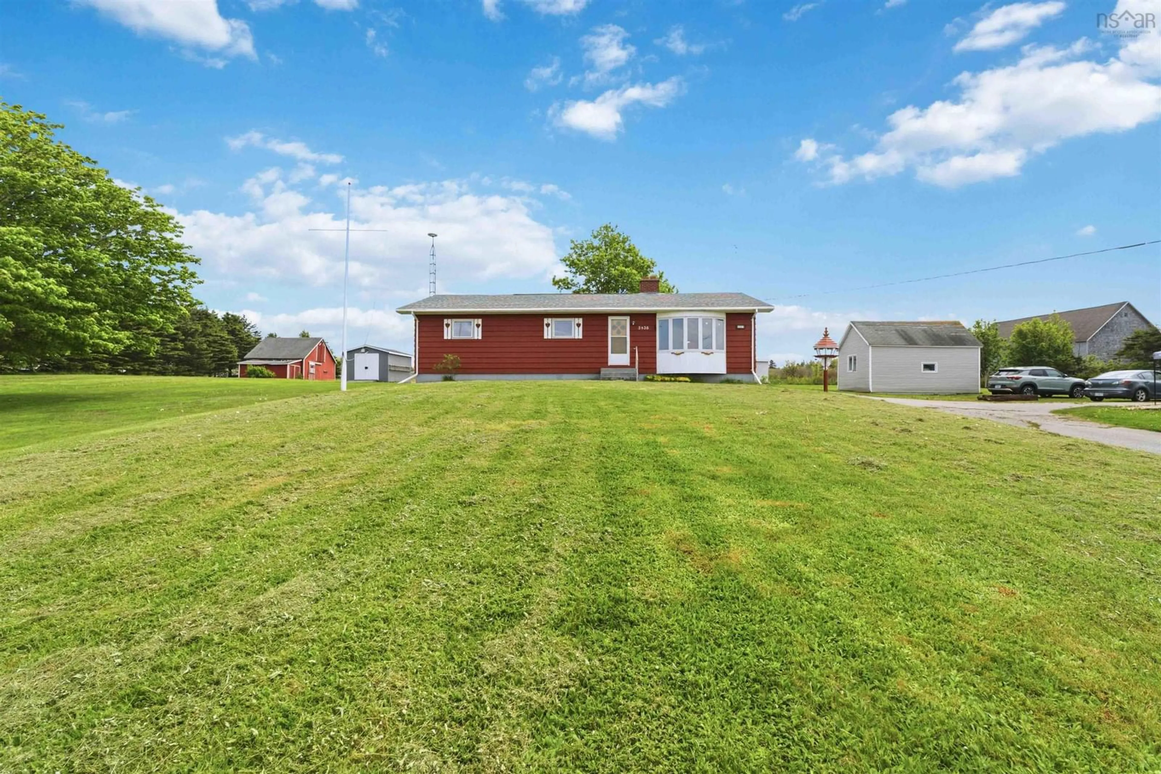 A pic from outside/outdoor area/front of a property/back of a property/a pic from drone, water/lake/river/ocean view for 3438 Highway 1, Belliveaus Cove Nova Scotia B0W 3T0