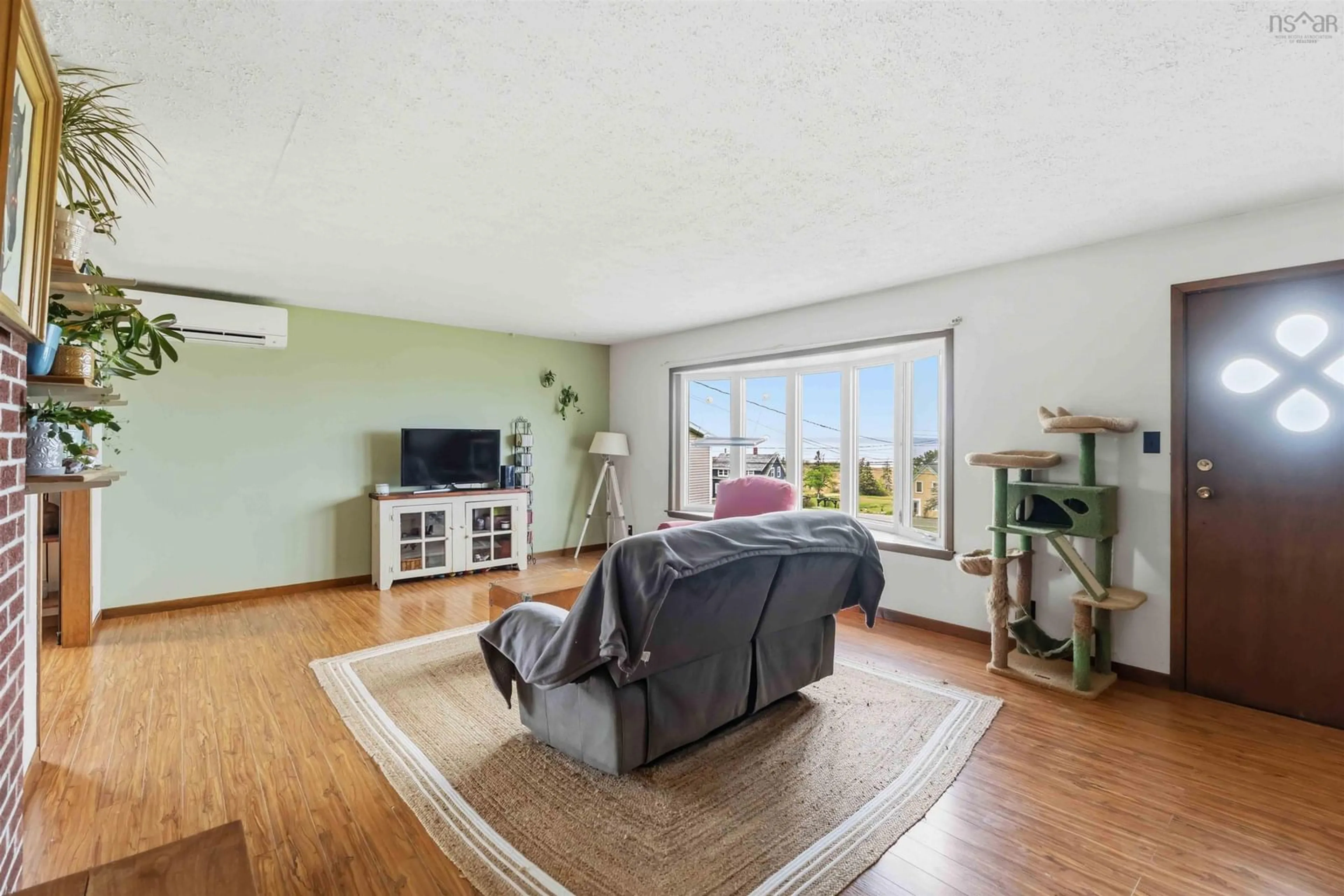 Living room with furniture, unknown for 3438 Highway 1, Belliveaus Cove Nova Scotia B0W 3T0