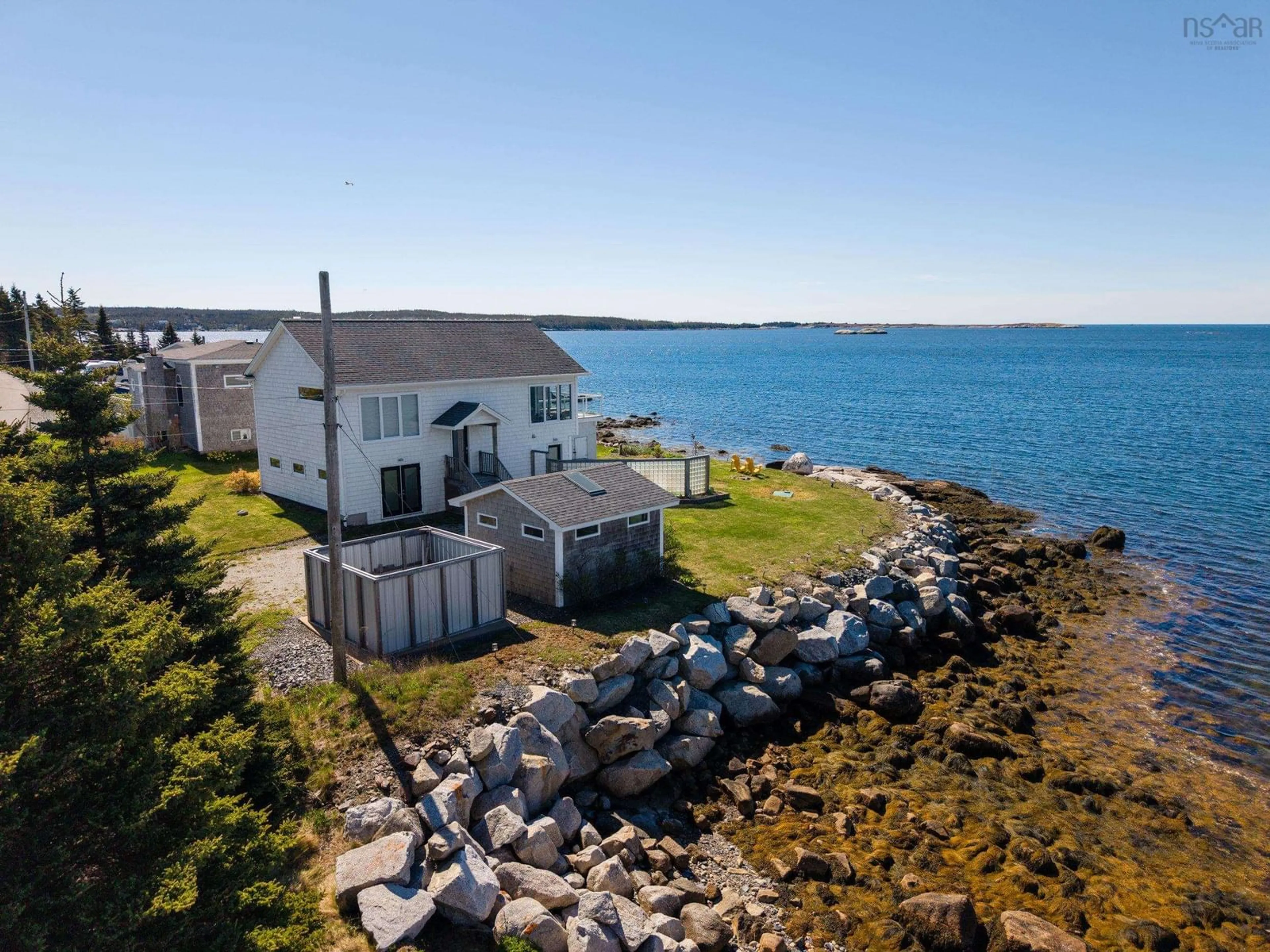 A pic from outside/outdoor area/front of a property/back of a property/a pic from drone, water/lake/river/ocean view for 39 Bull Point Rd, Sambro Nova Scotia B3V 1R3