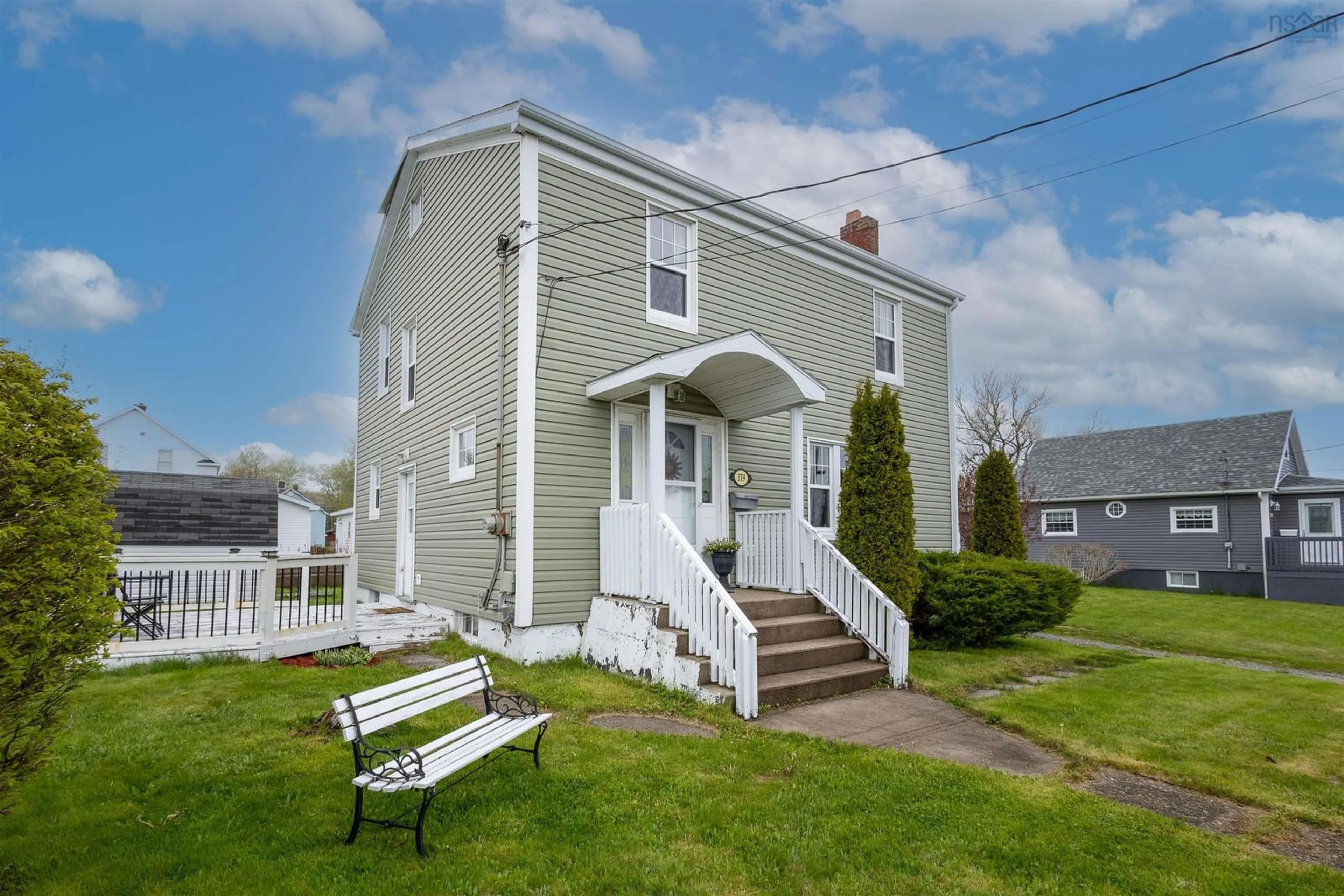 Home with vinyl exterior material, street for 379 Smith St, New Waterford Nova Scotia B1H 3R3