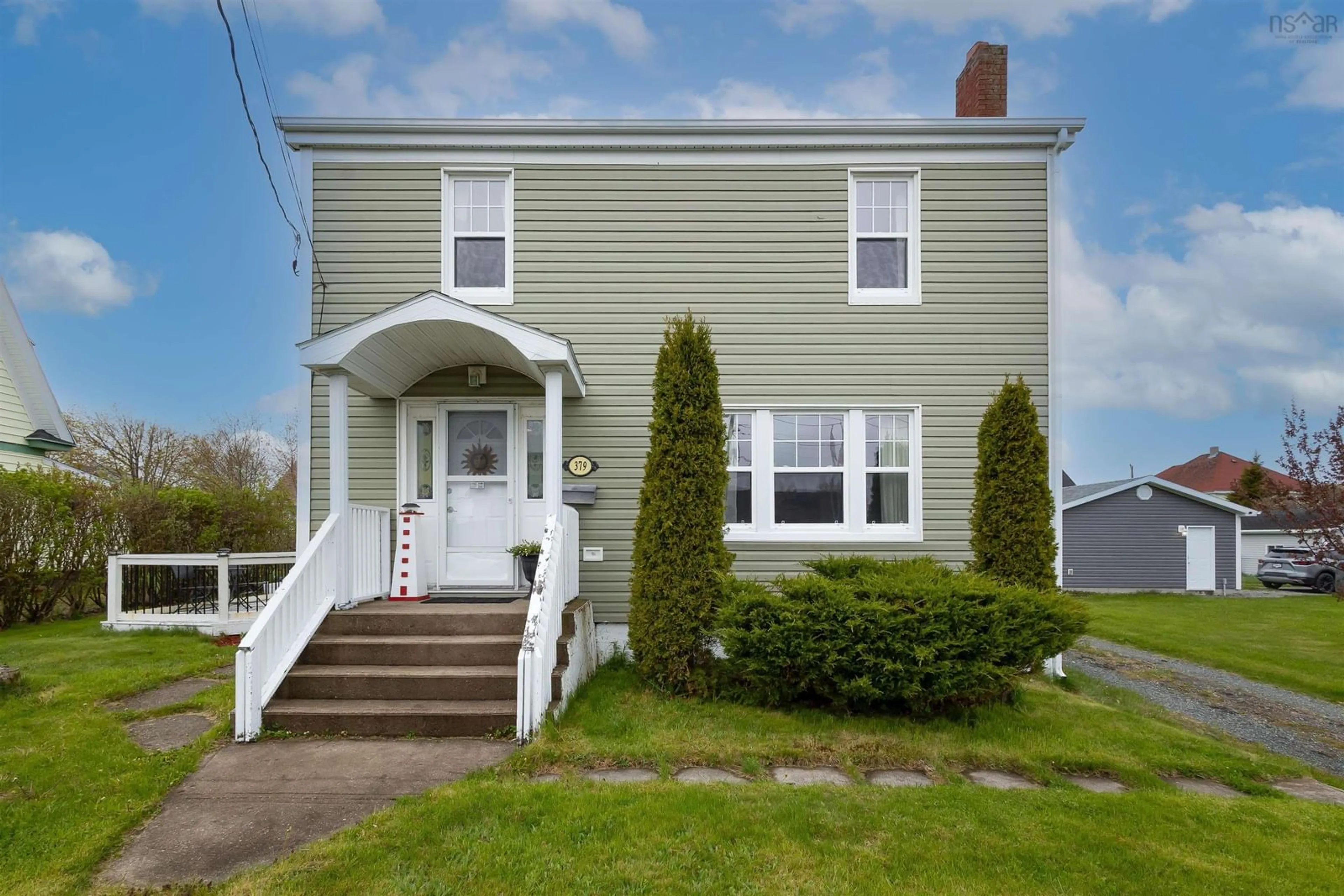 Home with vinyl exterior material, street for 379 Smith St, New Waterford Nova Scotia B1H 3R3