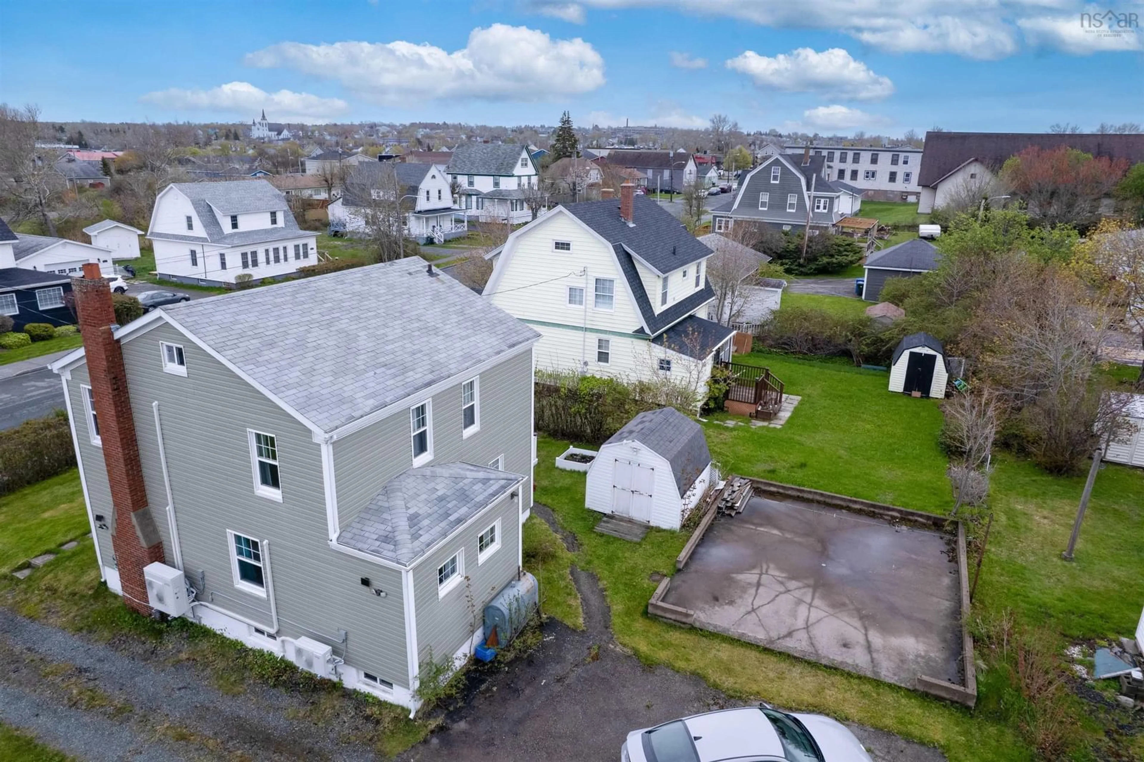 A pic from outside/outdoor area/front of a property/back of a property/a pic from drone, street for 379 Smith St, New Waterford Nova Scotia B1H 3R3