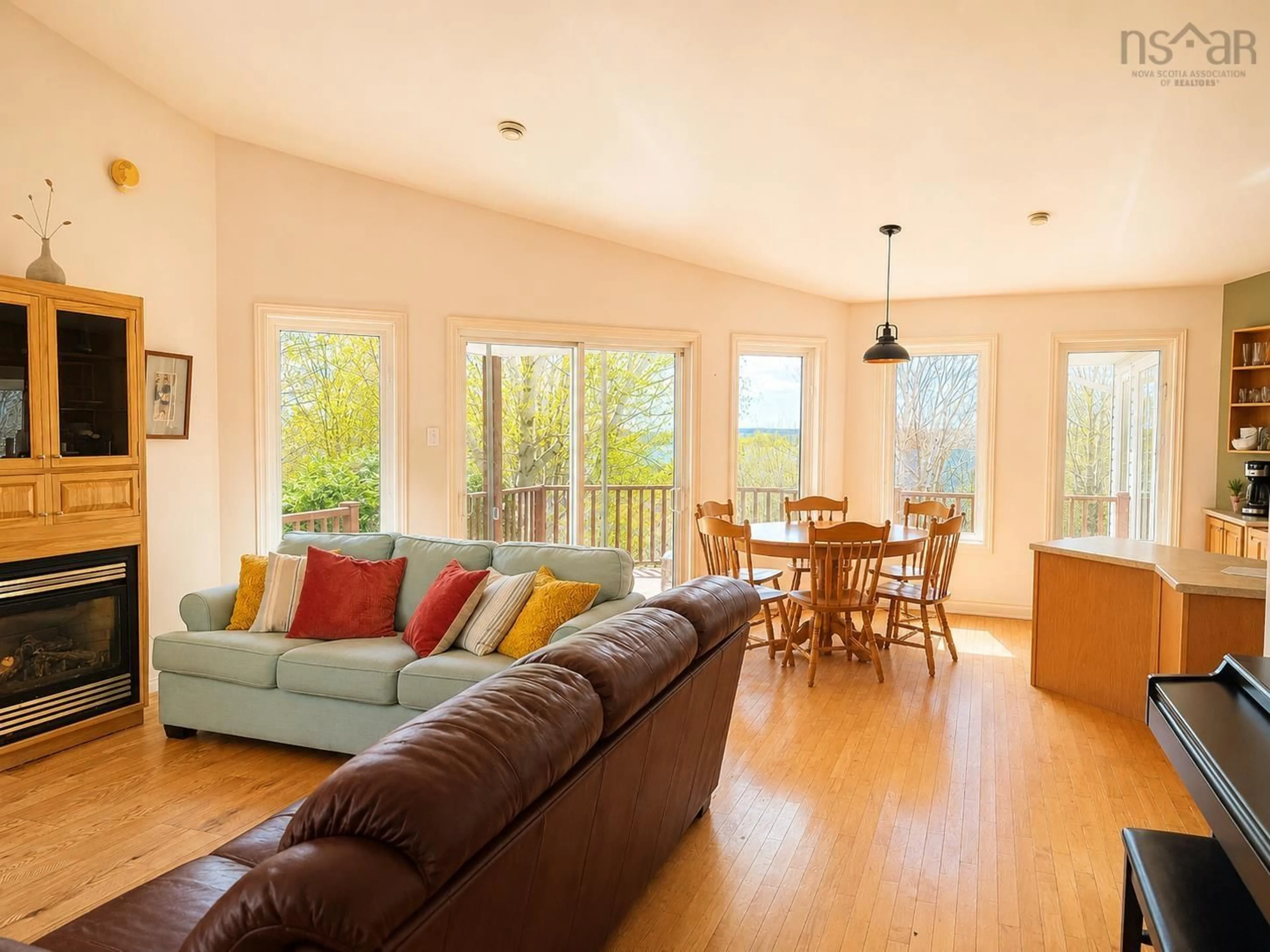 Living room with furniture, wood/laminate floor for 10797 Highway 105, Aberdeen Nova Scotia B0E 3M0