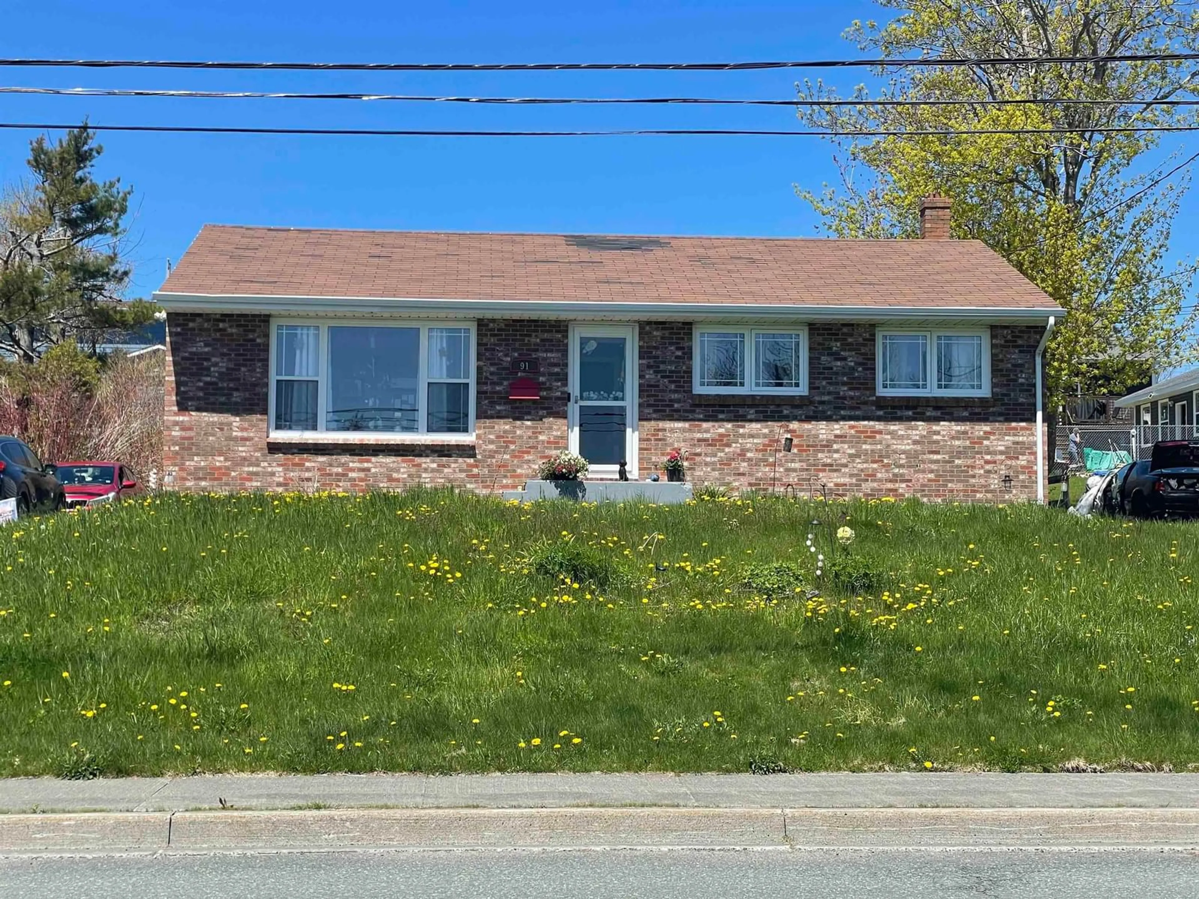 Home with brick exterior material, street for 91 Meech Ave, North Sydney Nova Scotia B2A 1R9