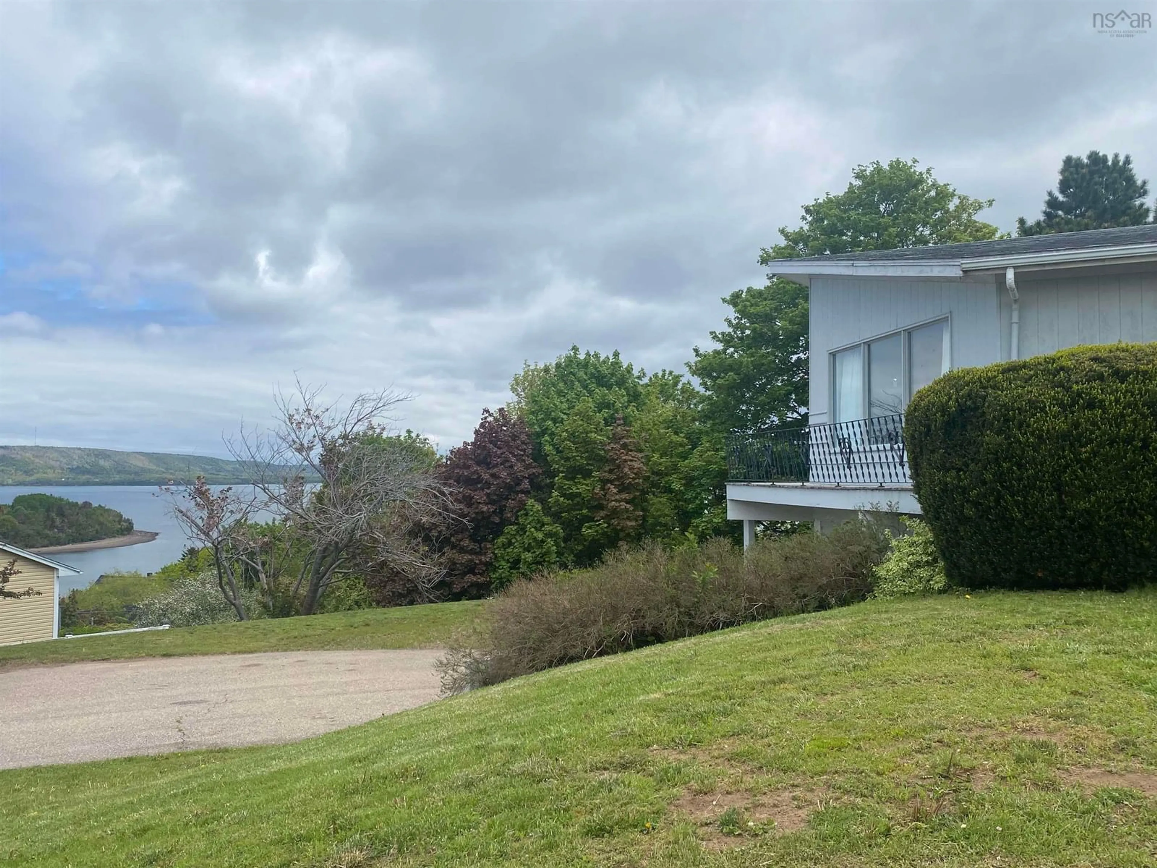 A pic from outside/outdoor area/front of a property/back of a property/a pic from drone, water/lake/river/ocean view for 190 Third Avenue, Digby Nova Scotia B0V 1A0