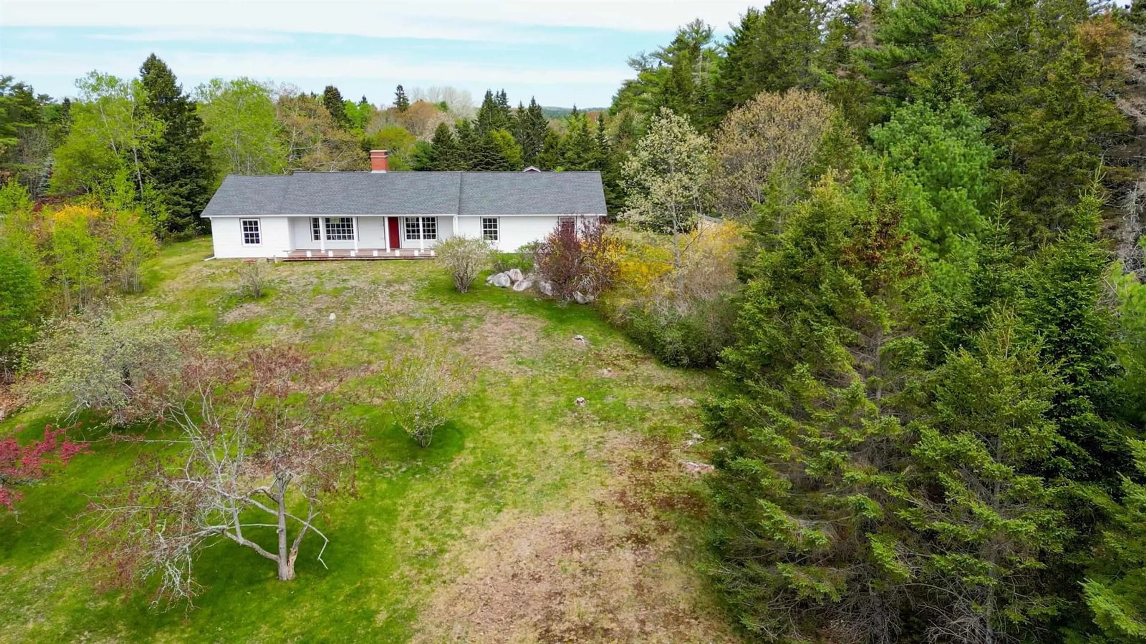 A pic from outside/outdoor area/front of a property/back of a property/a pic from drone, forest/trees view for 41 Eisnor Rd, Marriotts Cove Nova Scotia B0J 1K0