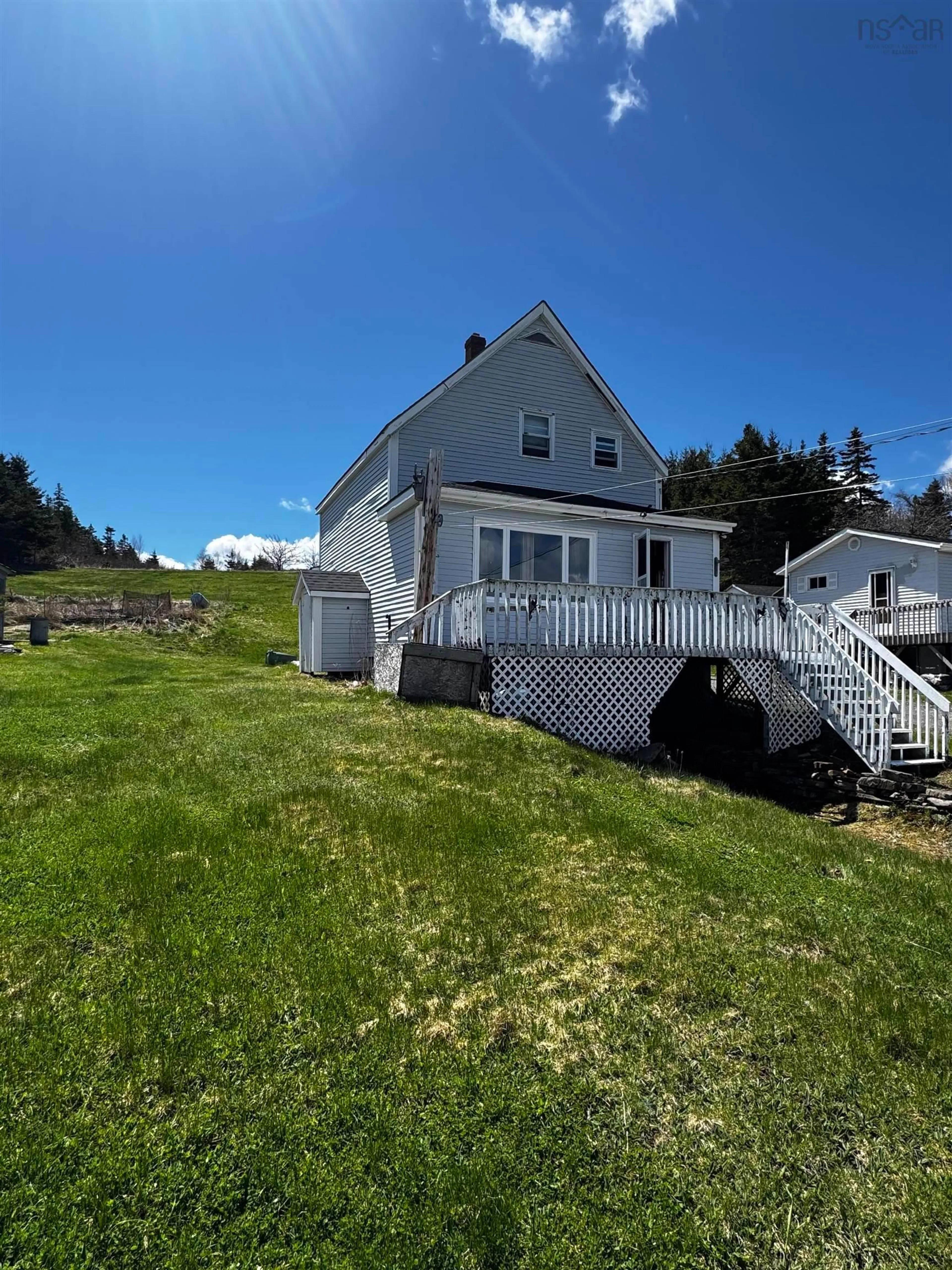 A pic from outside/outdoor area/front of a property/back of a property/a pic from drone, water/lake/river/ocean view for 5197 & 5199 Highway 16, Queensport Ns Hwy, Queensport Nova Scotia B0H 1N0