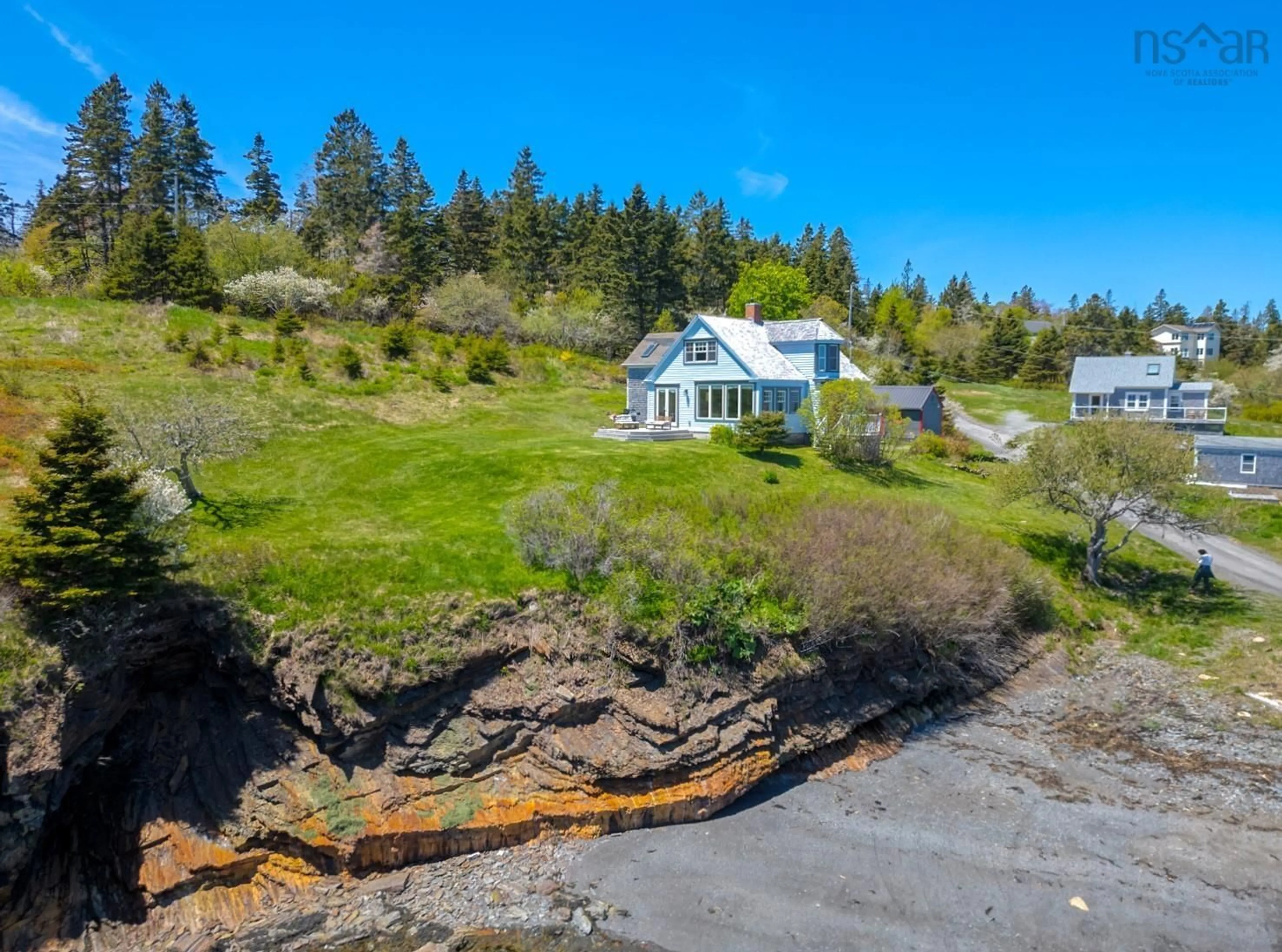 A pic from outside/outdoor area/front of a property/back of a property/a pic from drone, water/lake/river/ocean view for 41 Bells Cove Extension Rd, Dublin Shore Nova Scotia B0R 1C0
