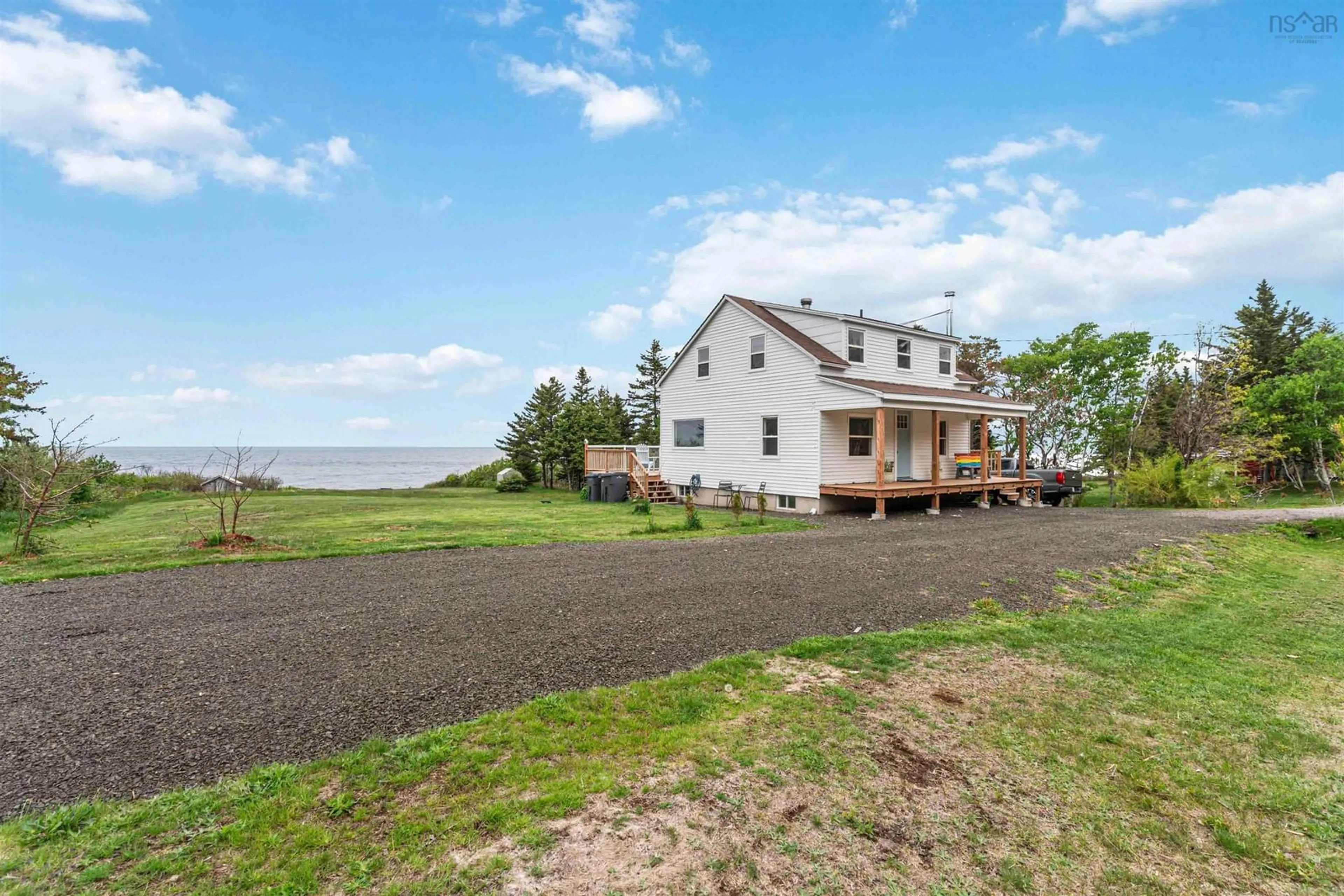 A pic from outside/outdoor area/front of a property/back of a property/a pic from drone, water/lake/river/ocean view for 6911 Shore Rd West Rd, Phinneys Cove Nova Scotia B0S 1L0