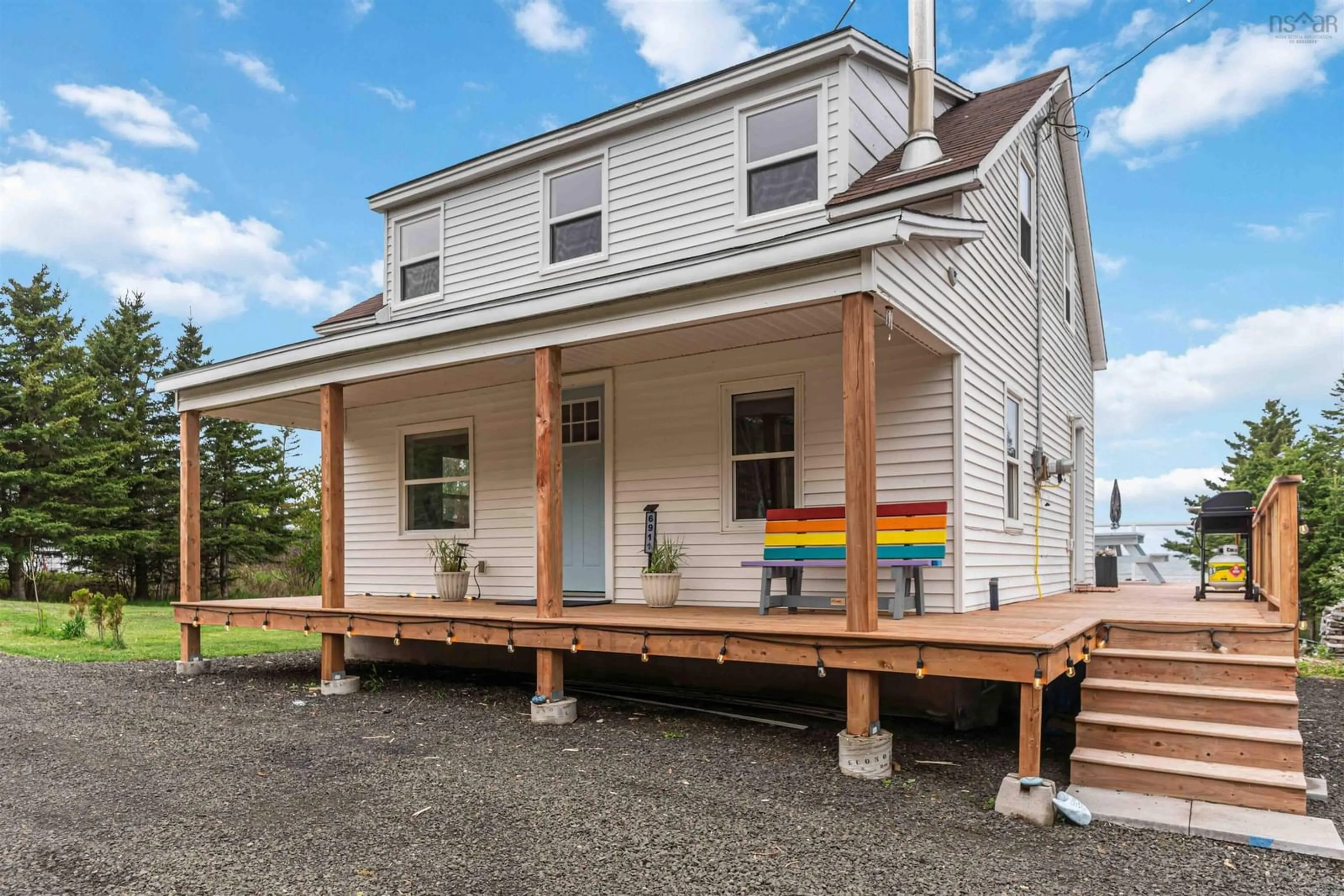 Home with vinyl exterior material, building for 6911 Shore Rd West Rd, Phinneys Cove Nova Scotia B0S 1L0