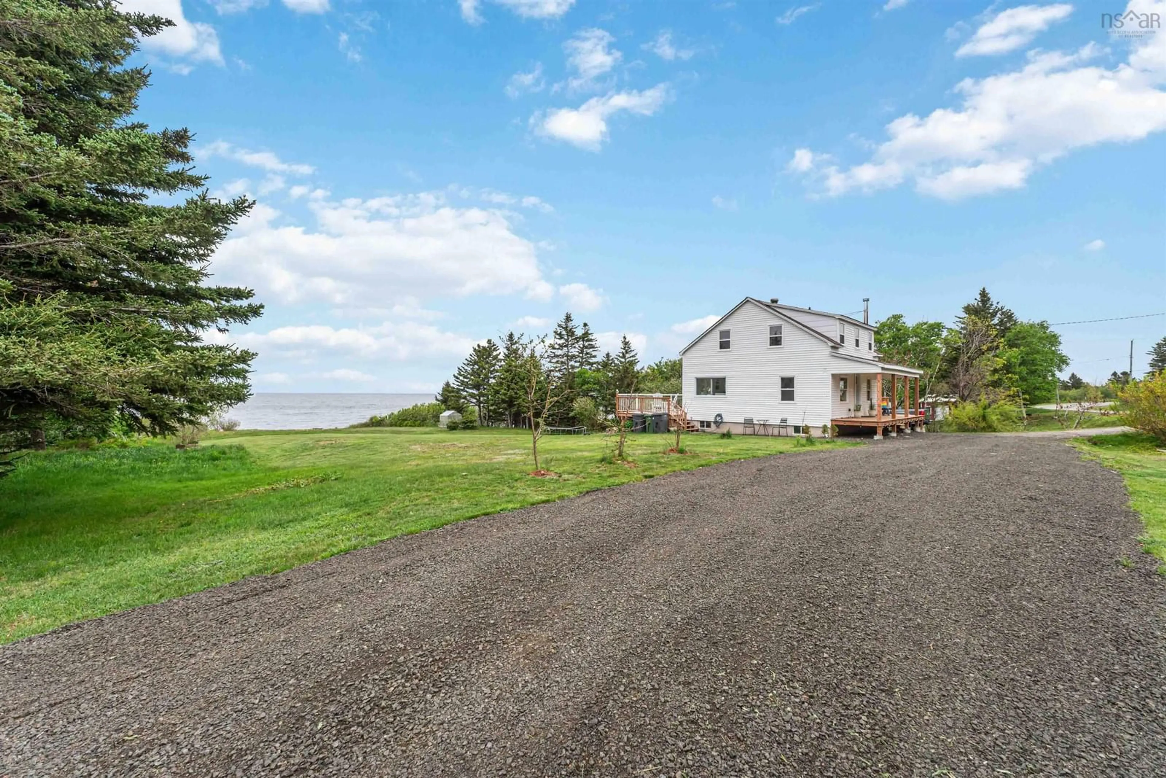 A pic from outside/outdoor area/front of a property/back of a property/a pic from drone, water/lake/river/ocean view for 6911 Shore Rd West Rd, Phinneys Cove Nova Scotia B0S 1L0