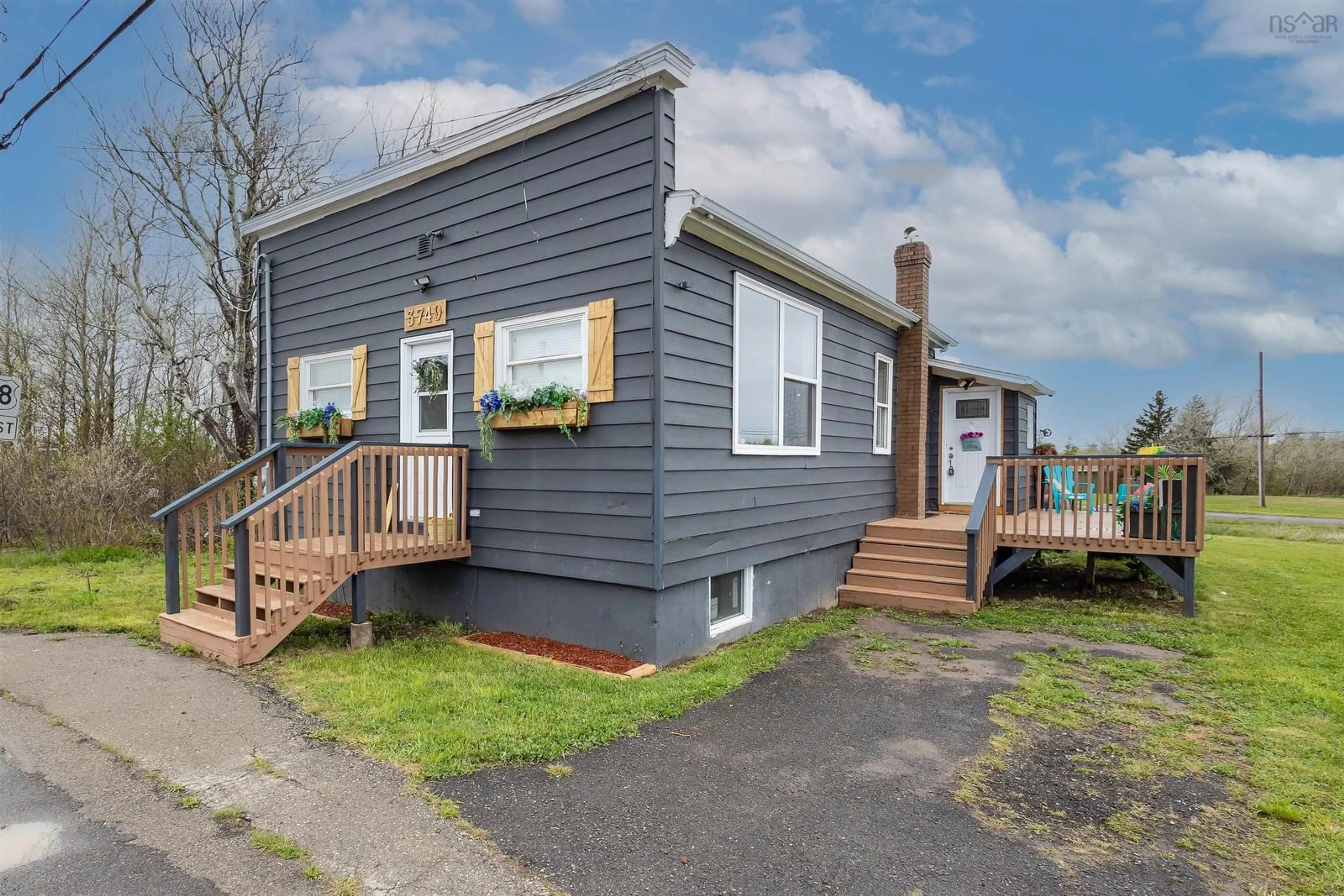 Home with vinyl exterior material, street for 3749 New Waterford Hwy, New Victoria Nova Scotia B1H 5B8
