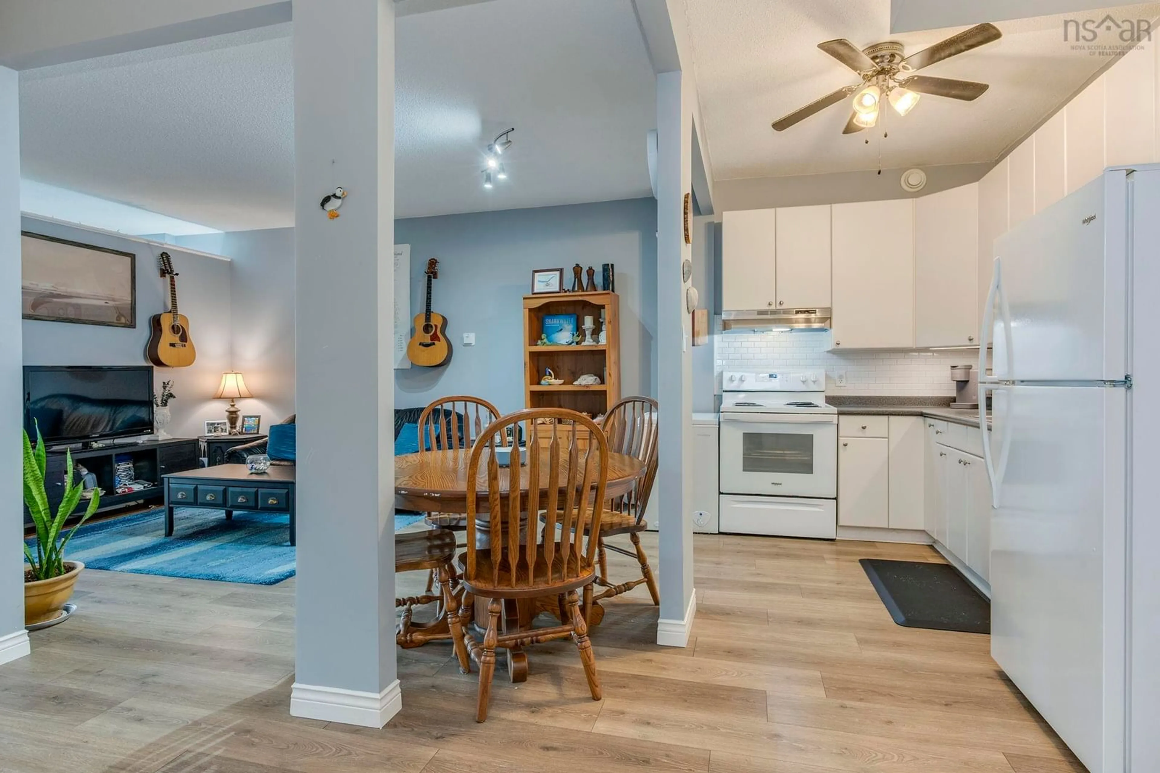 Open concept kitchen, wood/laminate floor for 6369 Coburg Rd #304, South End Nova Scotia B3H 4J7
