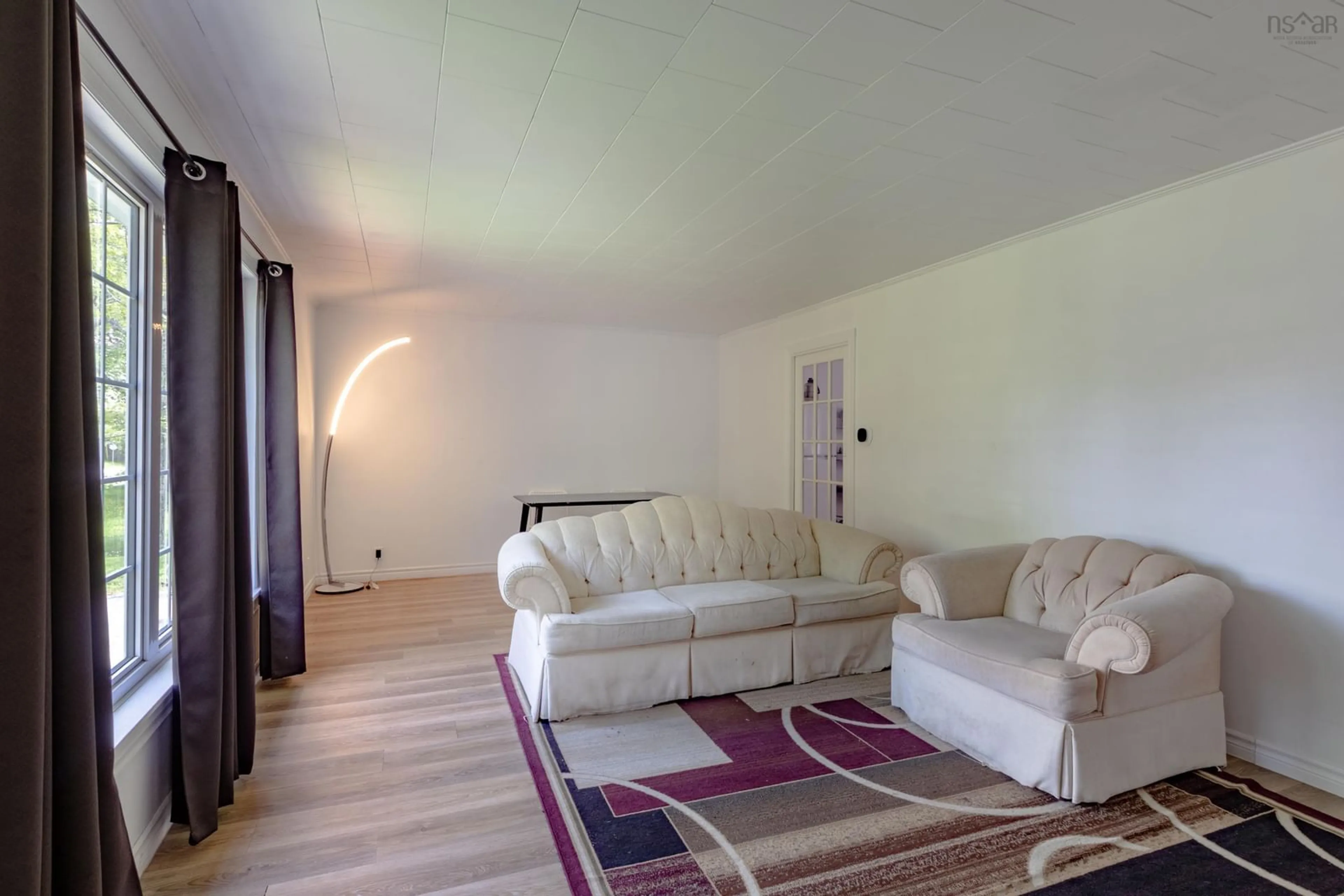 Living room with furniture, unknown for 119 Harriet St, Shelburne Nova Scotia B0T 1W0