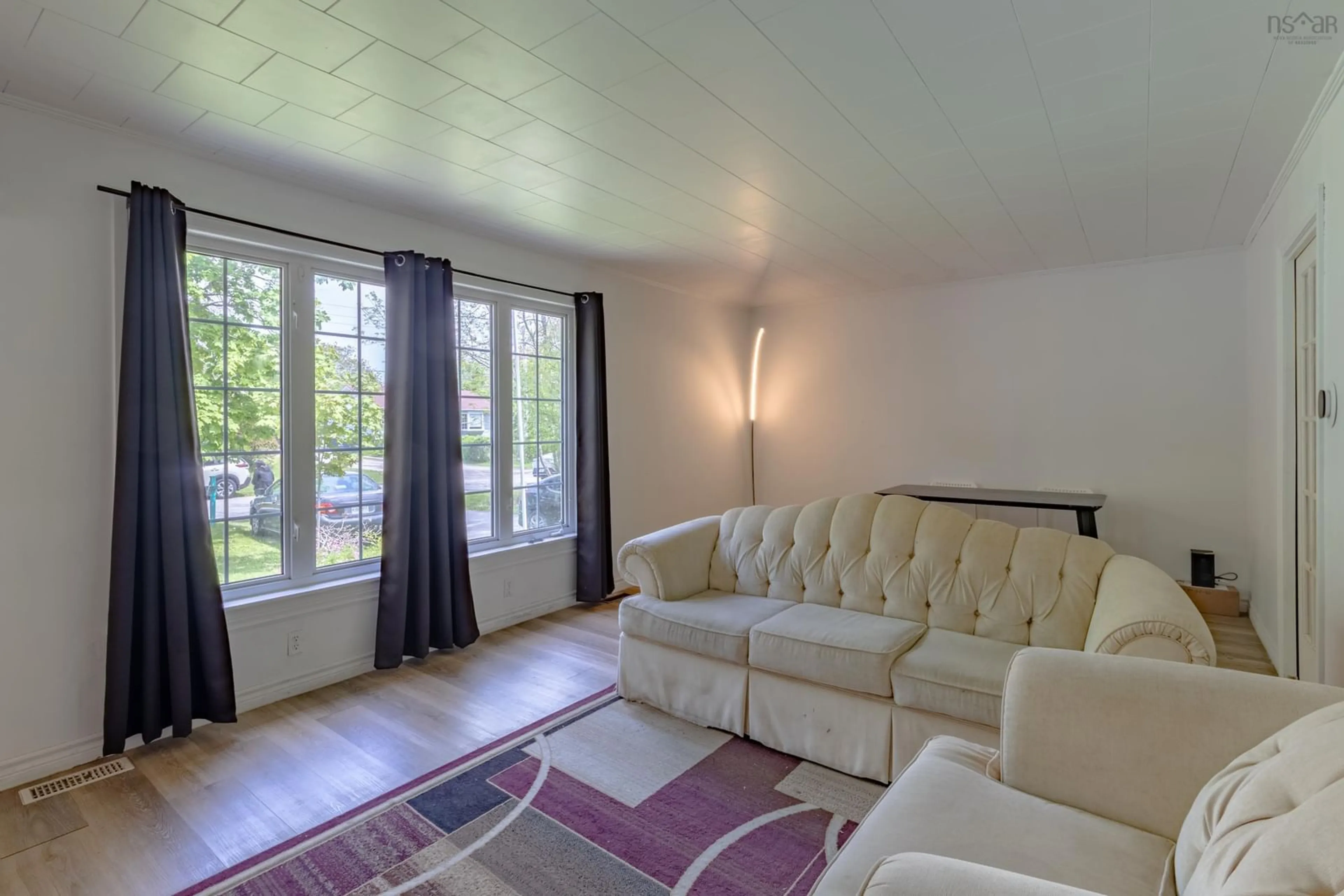 Living room with furniture, unknown for 119 Harriet St, Shelburne Nova Scotia B0T 1W0
