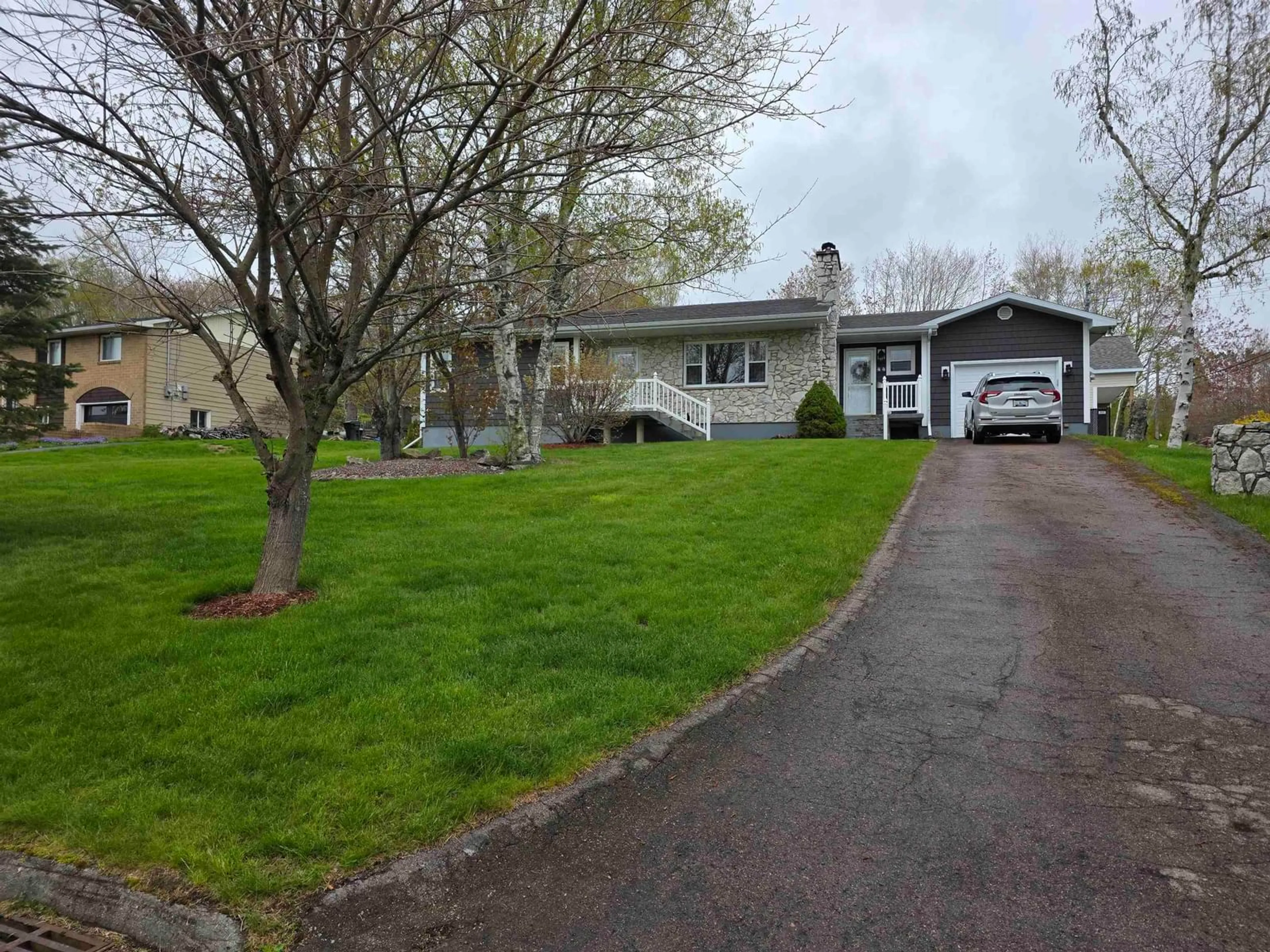 A pic from outside/outdoor area/front of a property/back of a property/a pic from drone, street for 44 Beaumont Ave, Sydney River Nova Scotia B1S 1J5