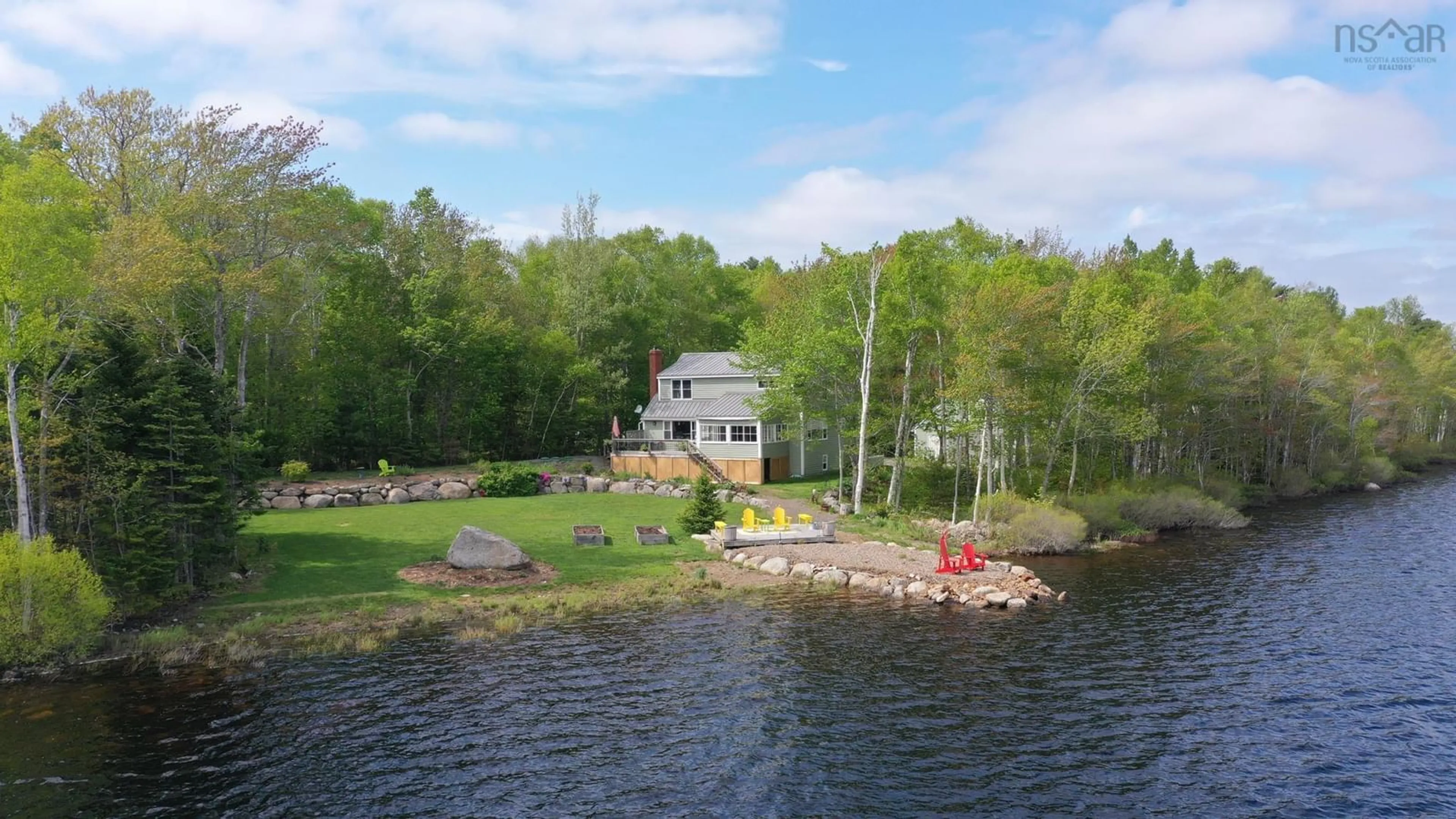 A pic from outside/outdoor area/front of a property/back of a property/a pic from drone, water/lake/river/ocean view for 530 Methals Rd, Black River Lake Nova Scotia B4P 1C9