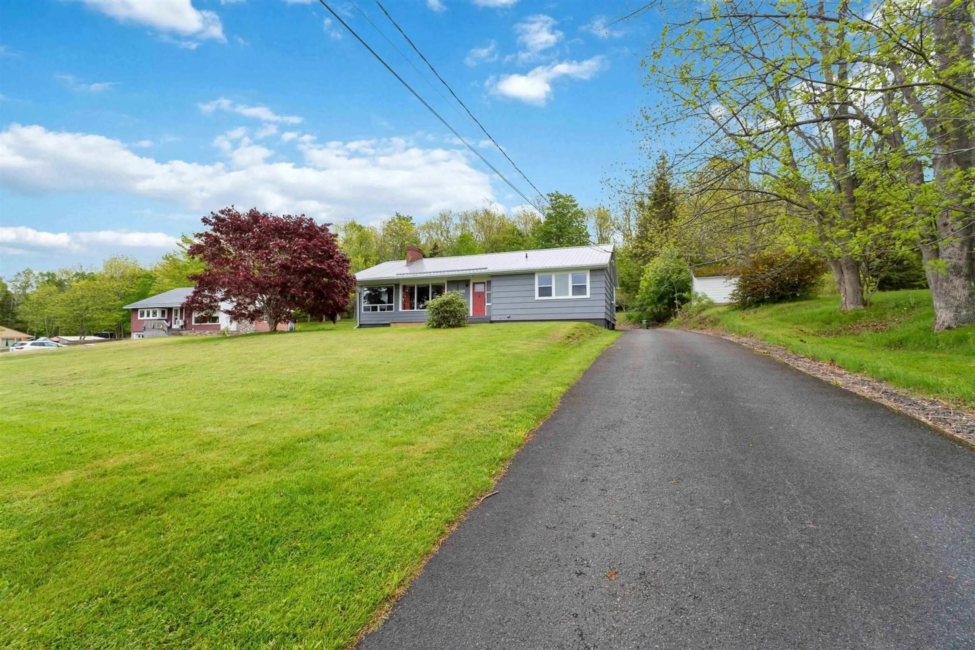 A pic from outside/outdoor area/front of a property/back of a property/a pic from drone, unknown for 700 Highway 1, Deep Brook Nova Scotia B0S 1J0