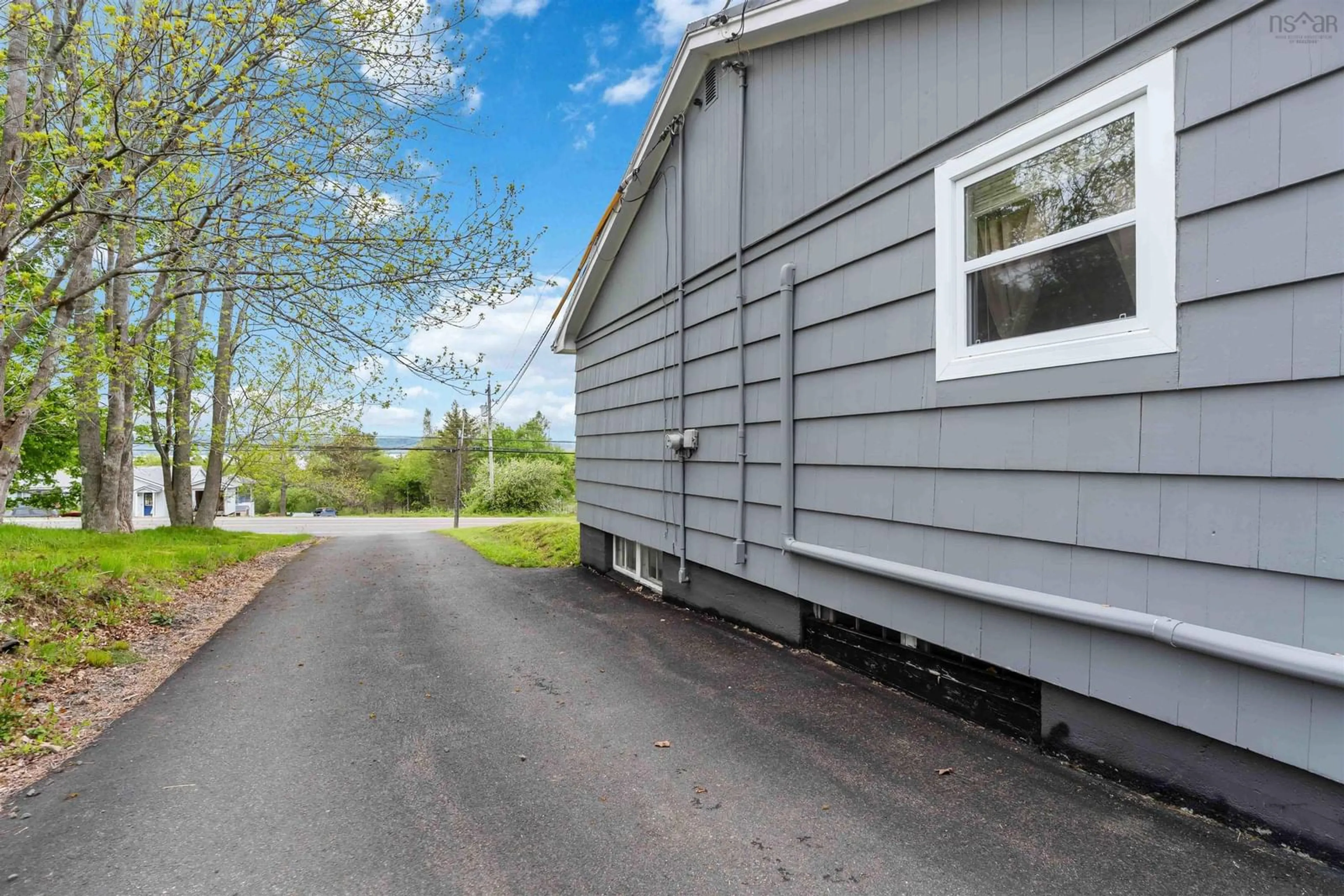 Home with vinyl exterior material, street for 700 Highway 1, Deep Brook Nova Scotia B0S 1J0