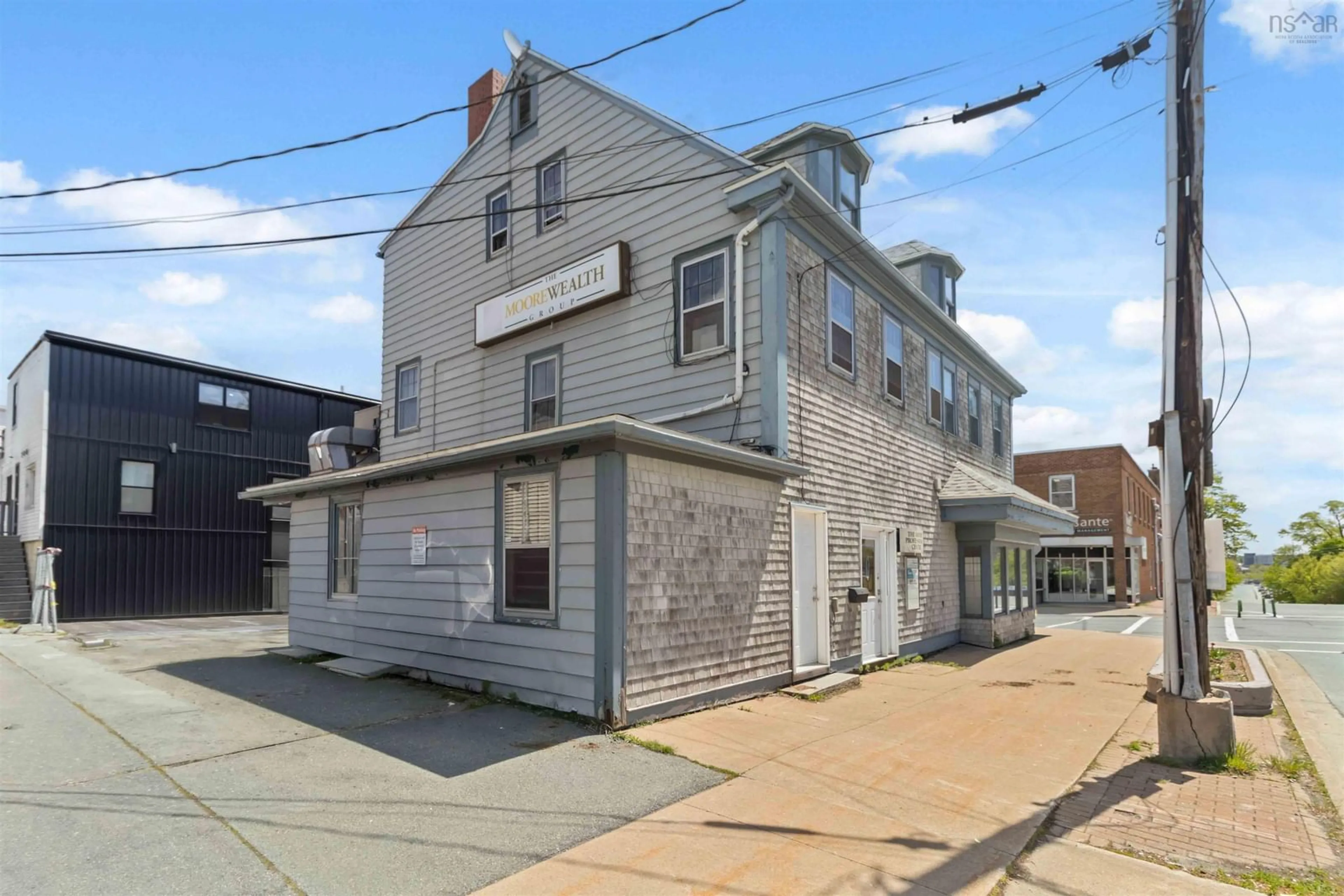 A pic from outside/outdoor area/front of a property/back of a property/a pic from drone, street for 71/75 Portland St, Dartmouth Nova Scotia B2Y 1H5