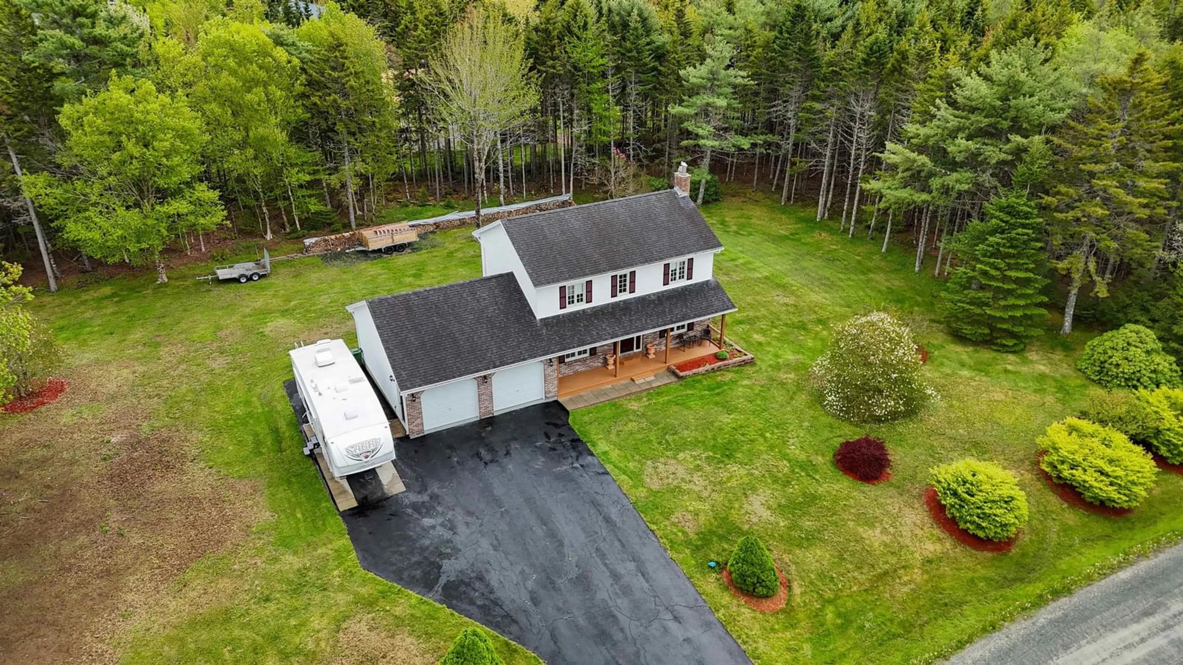 A pic from outside/outdoor area/front of a property/back of a property/a pic from drone, unknown for 2 Brandy Crt, Hammonds Plains Nova Scotia B4B 1M9