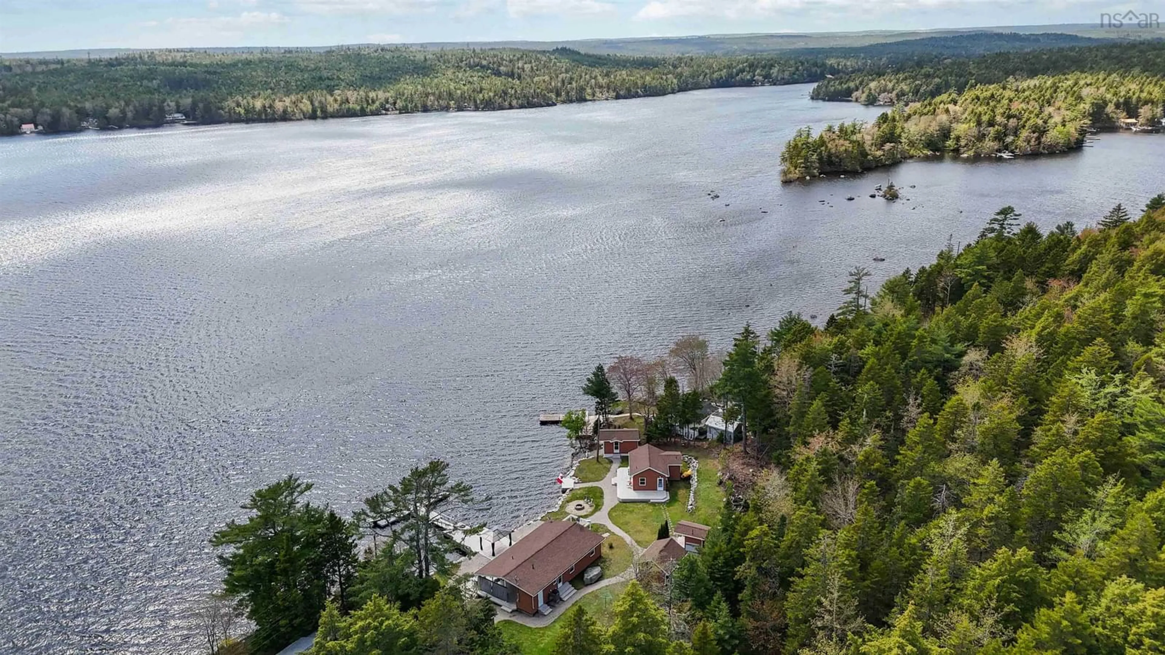 A pic from outside/outdoor area/front of a property/back of a property/a pic from drone, water/lake/river/ocean view for 815 Dauphinees Mill Lake Water A, Hubbards Nova Scotia B0J 1T0
