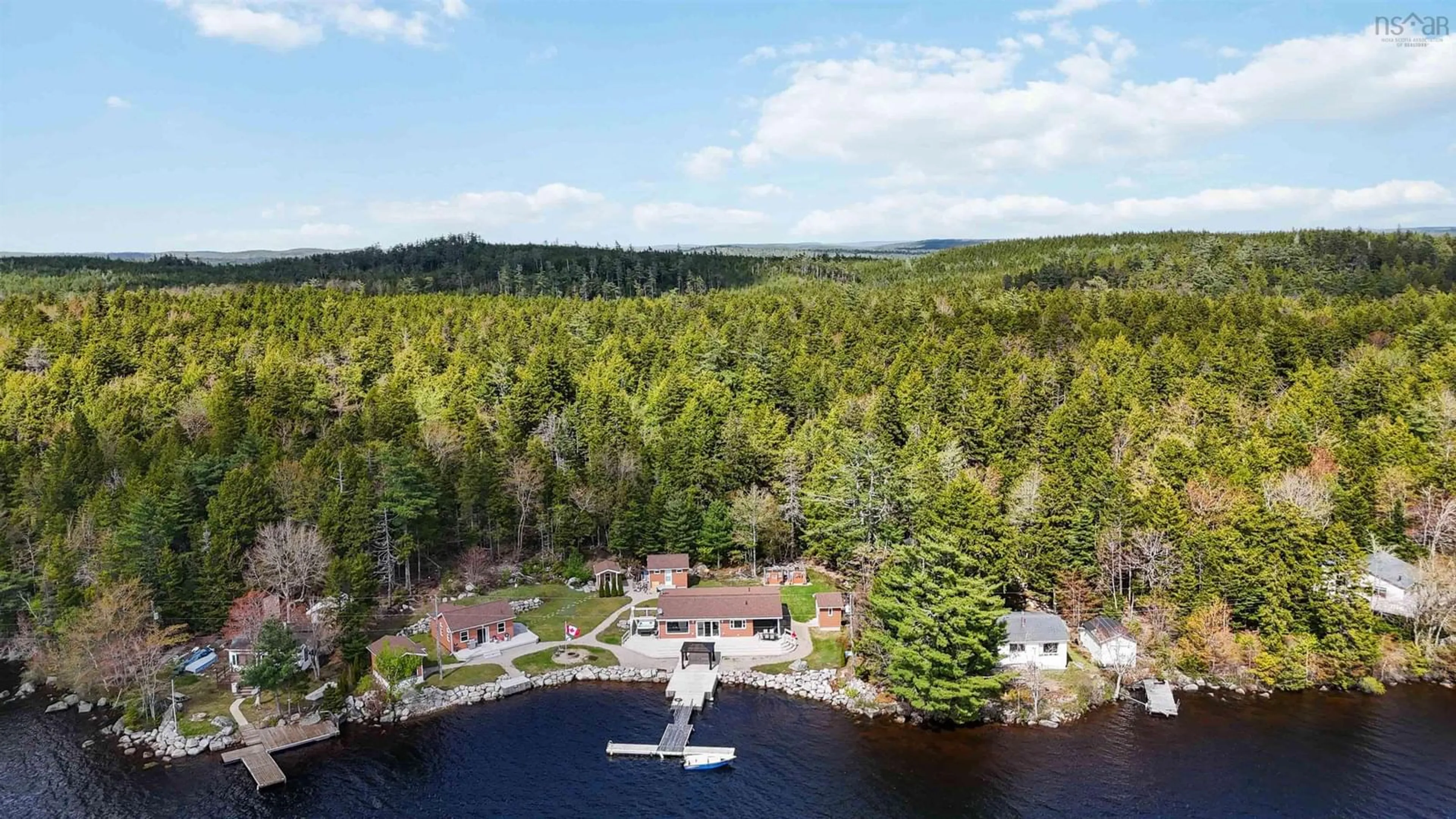 A pic from outside/outdoor area/front of a property/back of a property/a pic from drone, water/lake/river/ocean view for 815 Dauphinees Mill Lake Water A, Hubbards Nova Scotia B0J 1T0