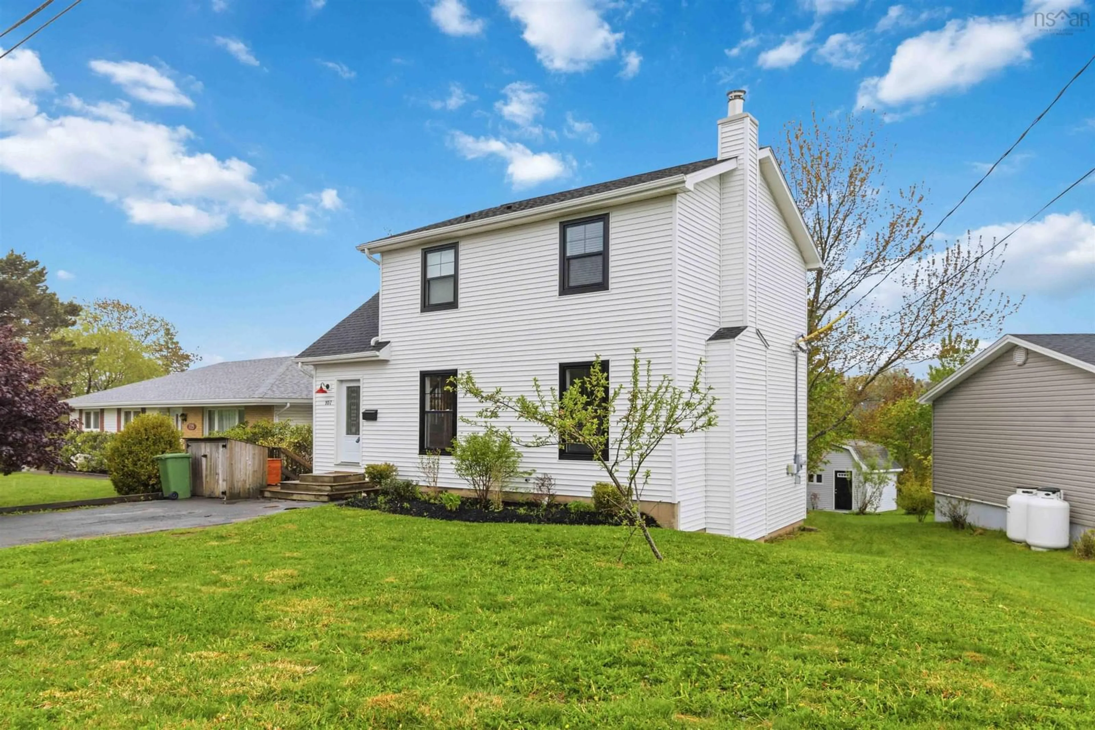 Home with vinyl exterior material, street for 107 Astral Dr, Dartmouth Nova Scotia B2V 1B6