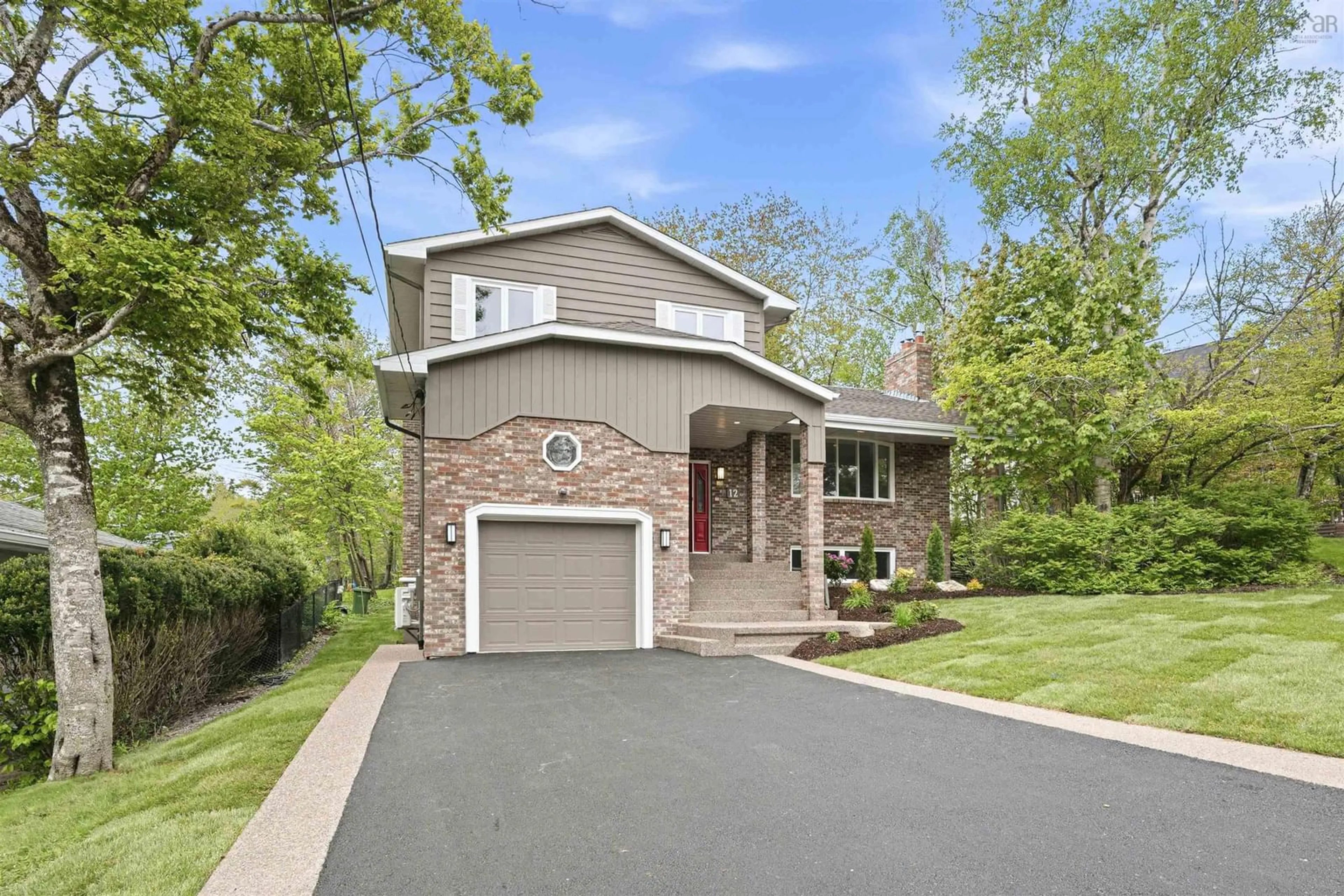 Home with brick exterior material, street for 12 Broadholme Lane, Halifax Nova Scotia B3M 3B7