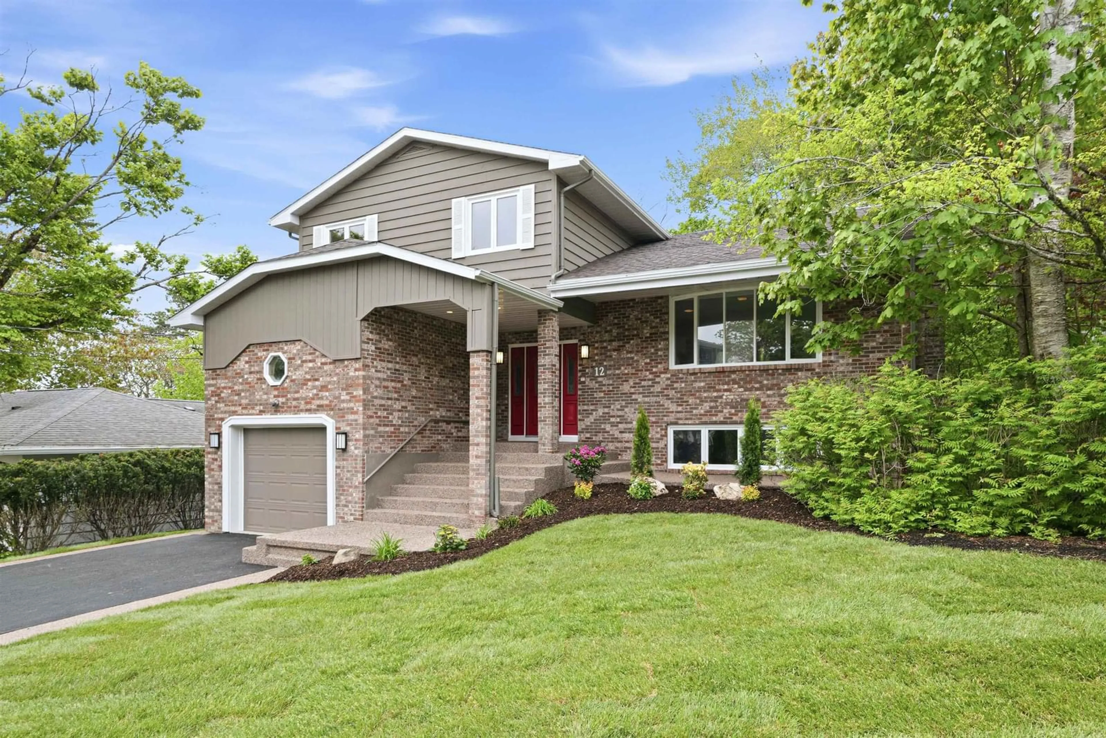 Home with brick exterior material, street for 12 Broadholme Lane, Halifax Nova Scotia B3M 3B7