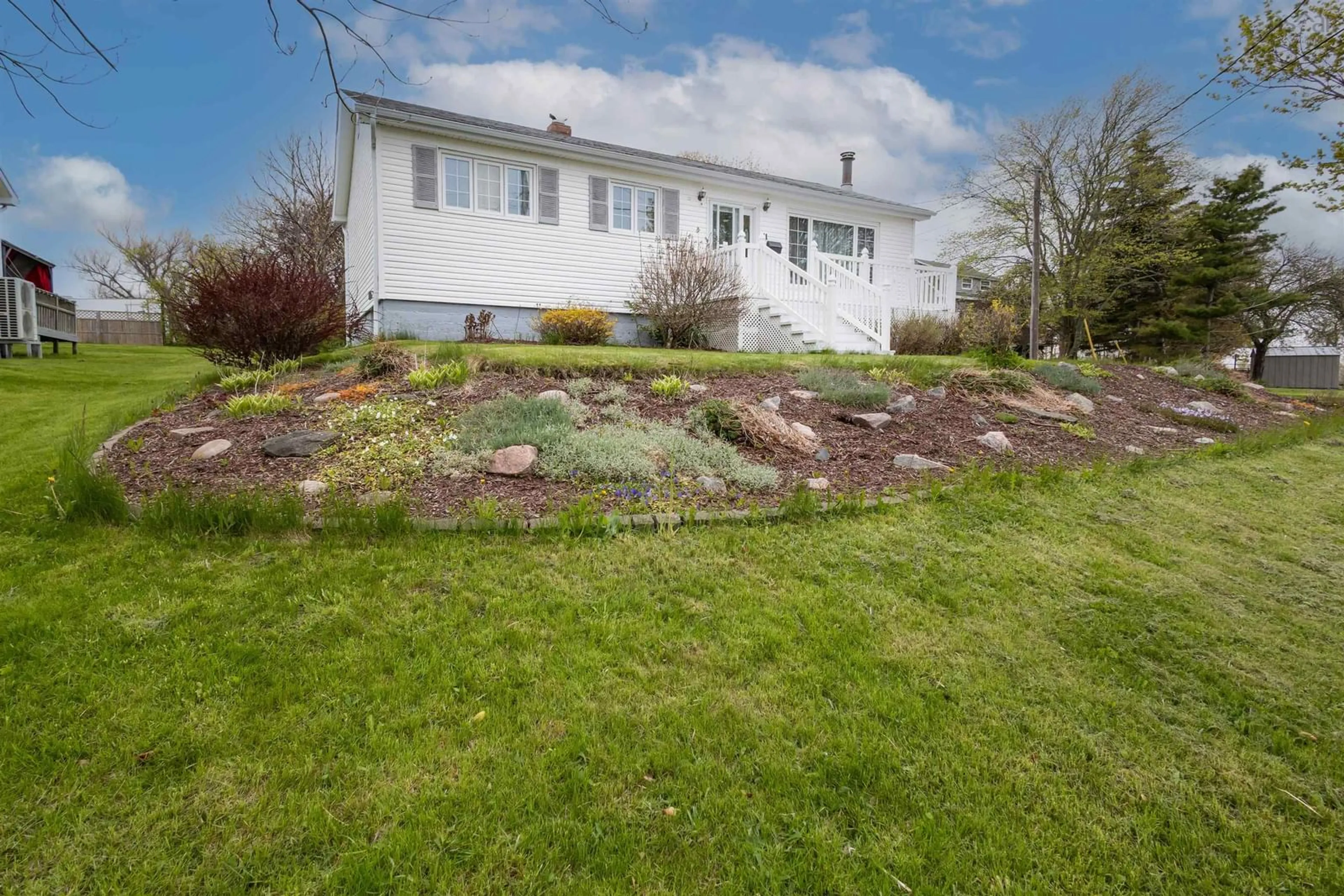 A pic from outside/outdoor area/front of a property/back of a property/a pic from drone, unknown for 11 Maclean St, Sydney Mines Nova Scotia B1V 1E1