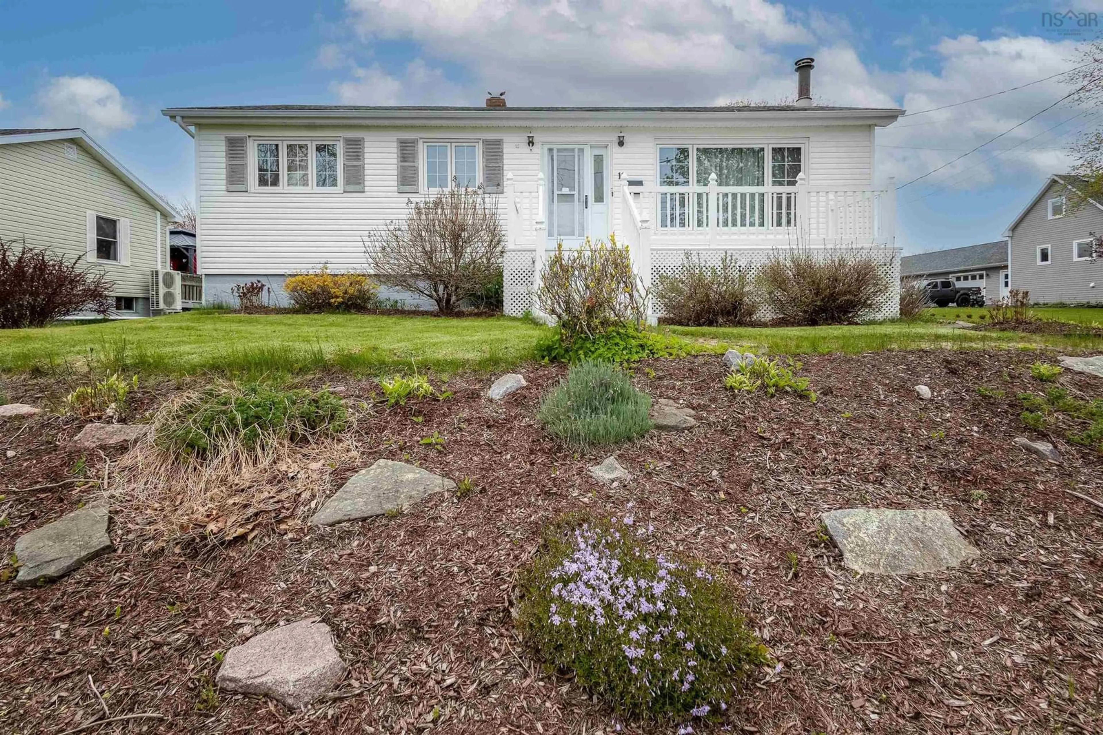 Home with vinyl exterior material, street for 11 Maclean St, Sydney Mines Nova Scotia B1V 1E1