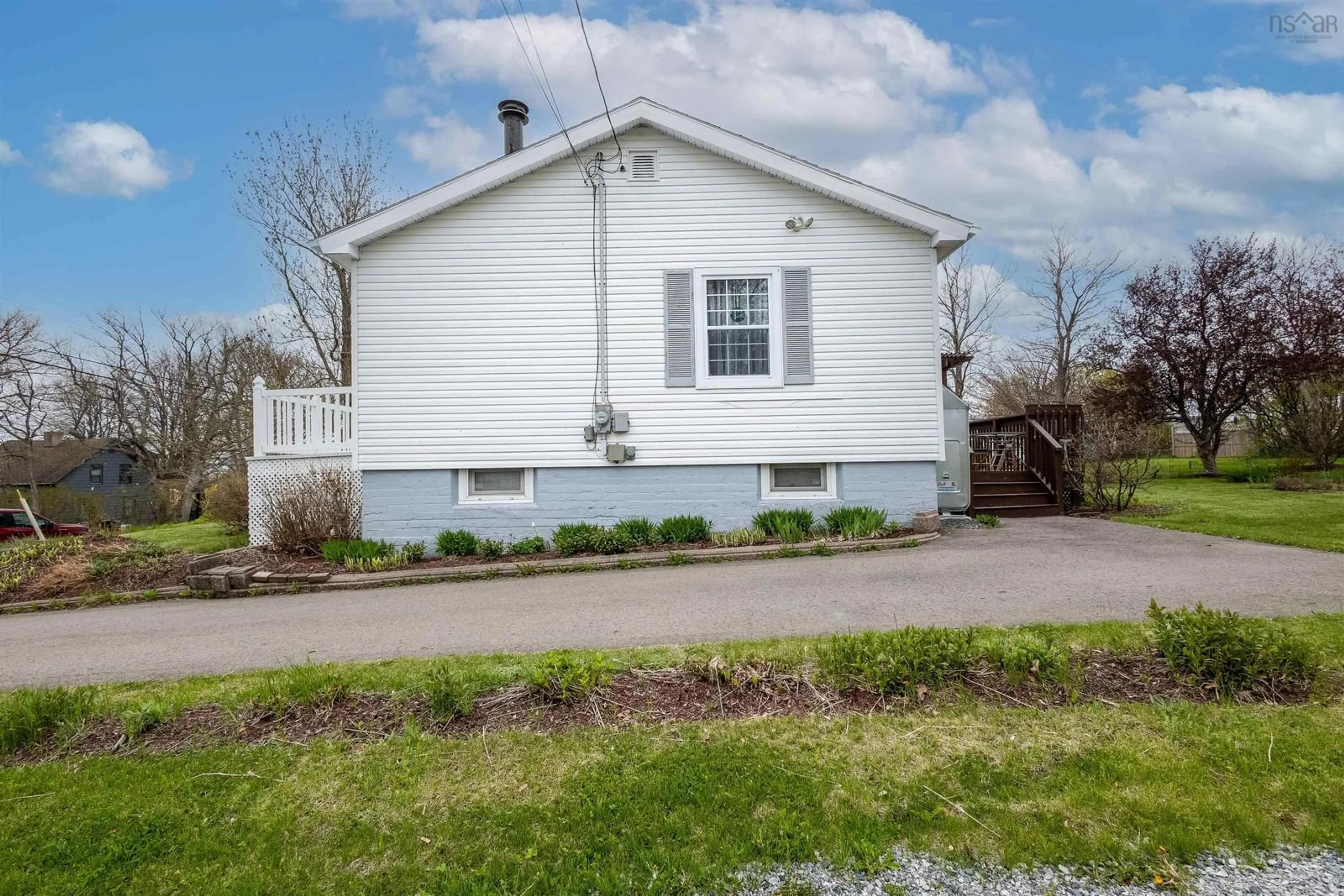 Home with vinyl exterior material, street for 11 Maclean St, Sydney Mines Nova Scotia B1V 1E1