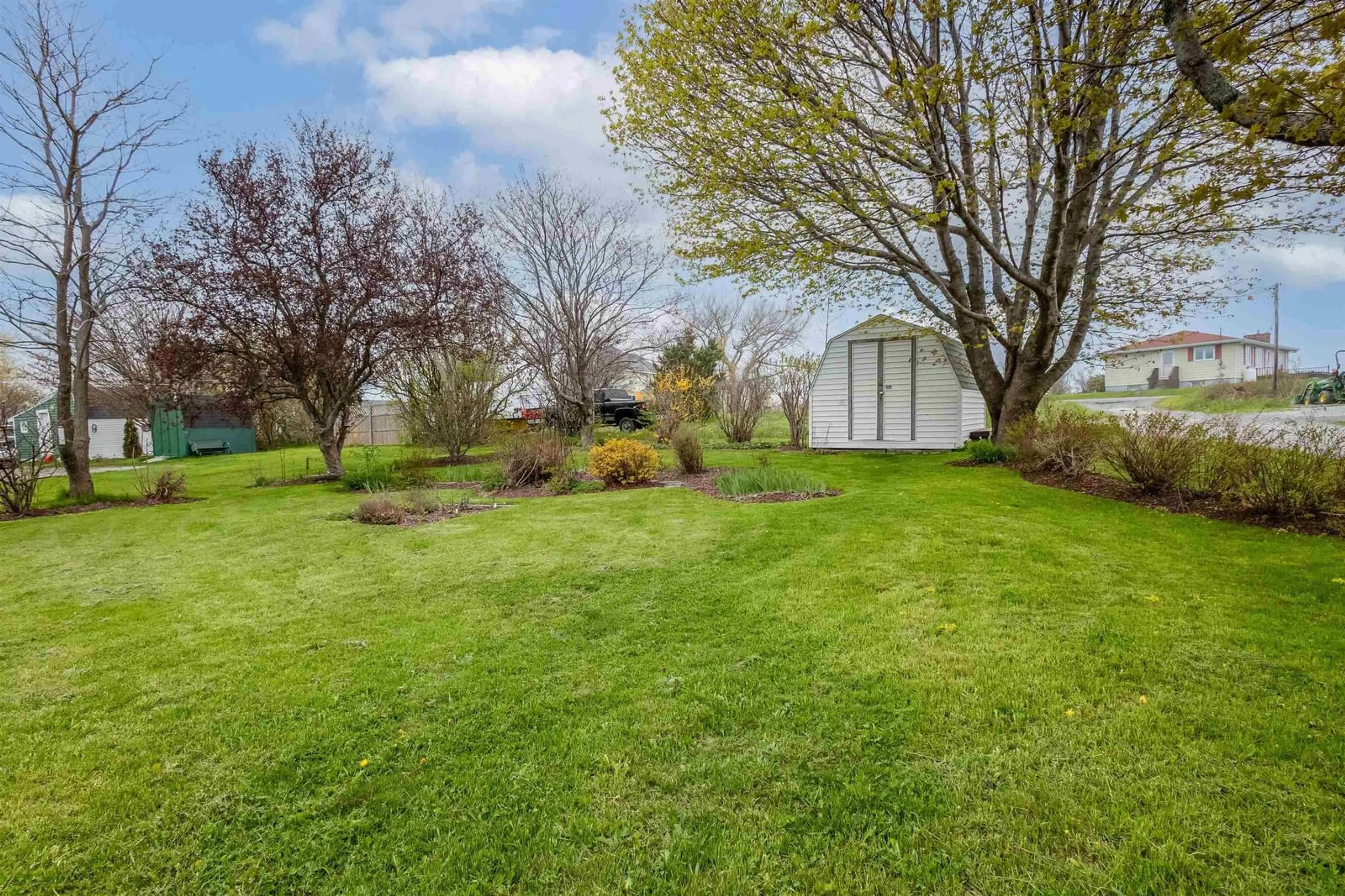 A pic from outside/outdoor area/front of a property/back of a property/a pic from drone, water/lake/river/ocean view for 11 Maclean St, Sydney Mines Nova Scotia B1V 1E1
